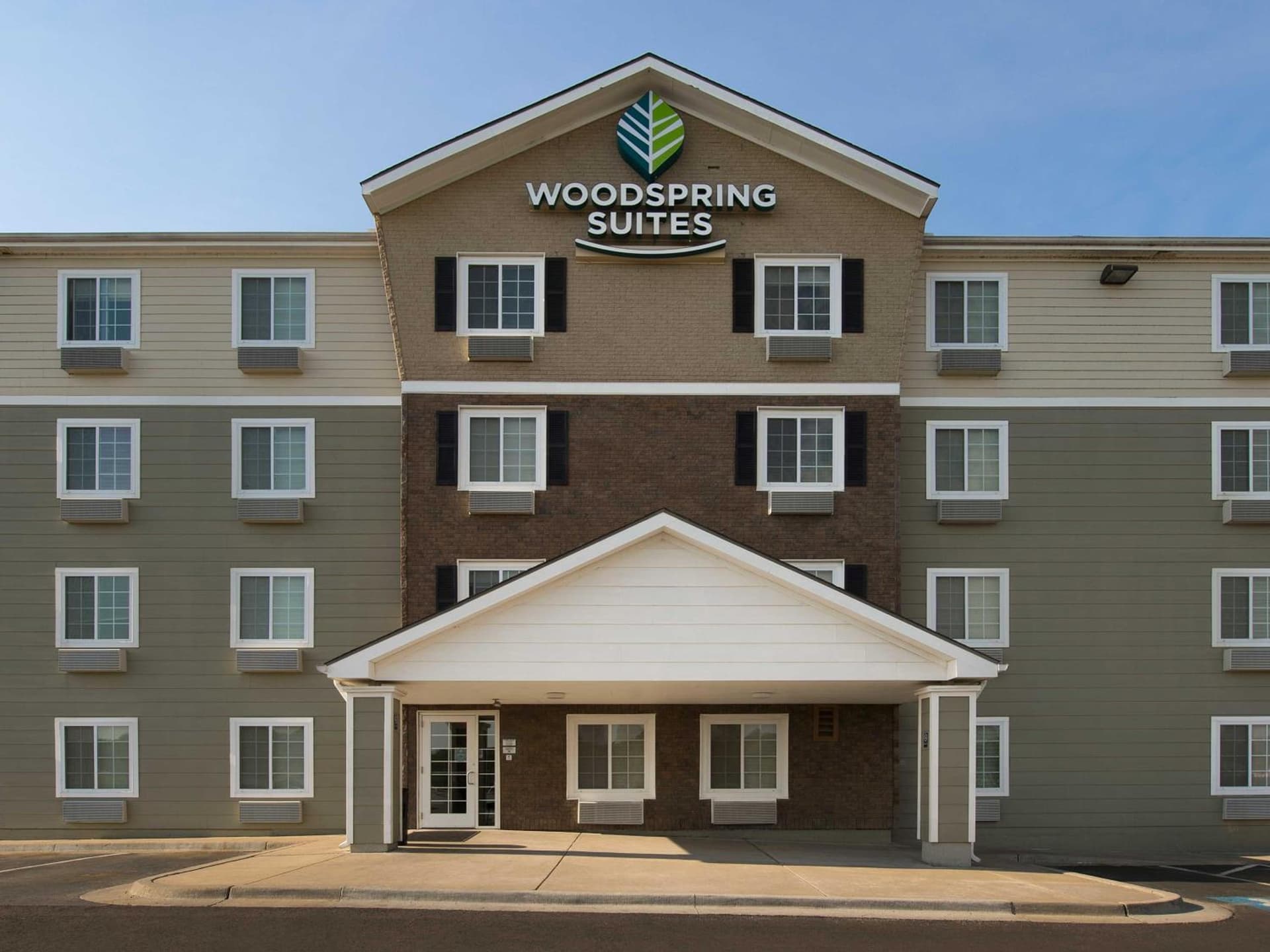 WoodSpring Suites Kansas City Mission featured exterior or lobby in Merriam, KS — similar hotel