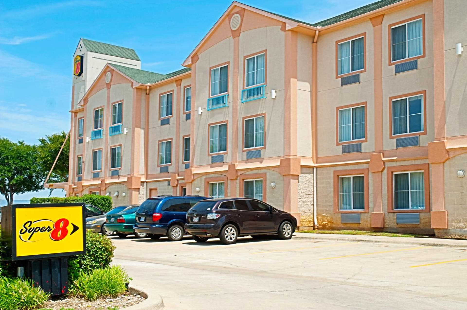 Super 8 by Wyndham Irving/DFW Apt/North exterior or lobby in Irving, TX — main listing photo