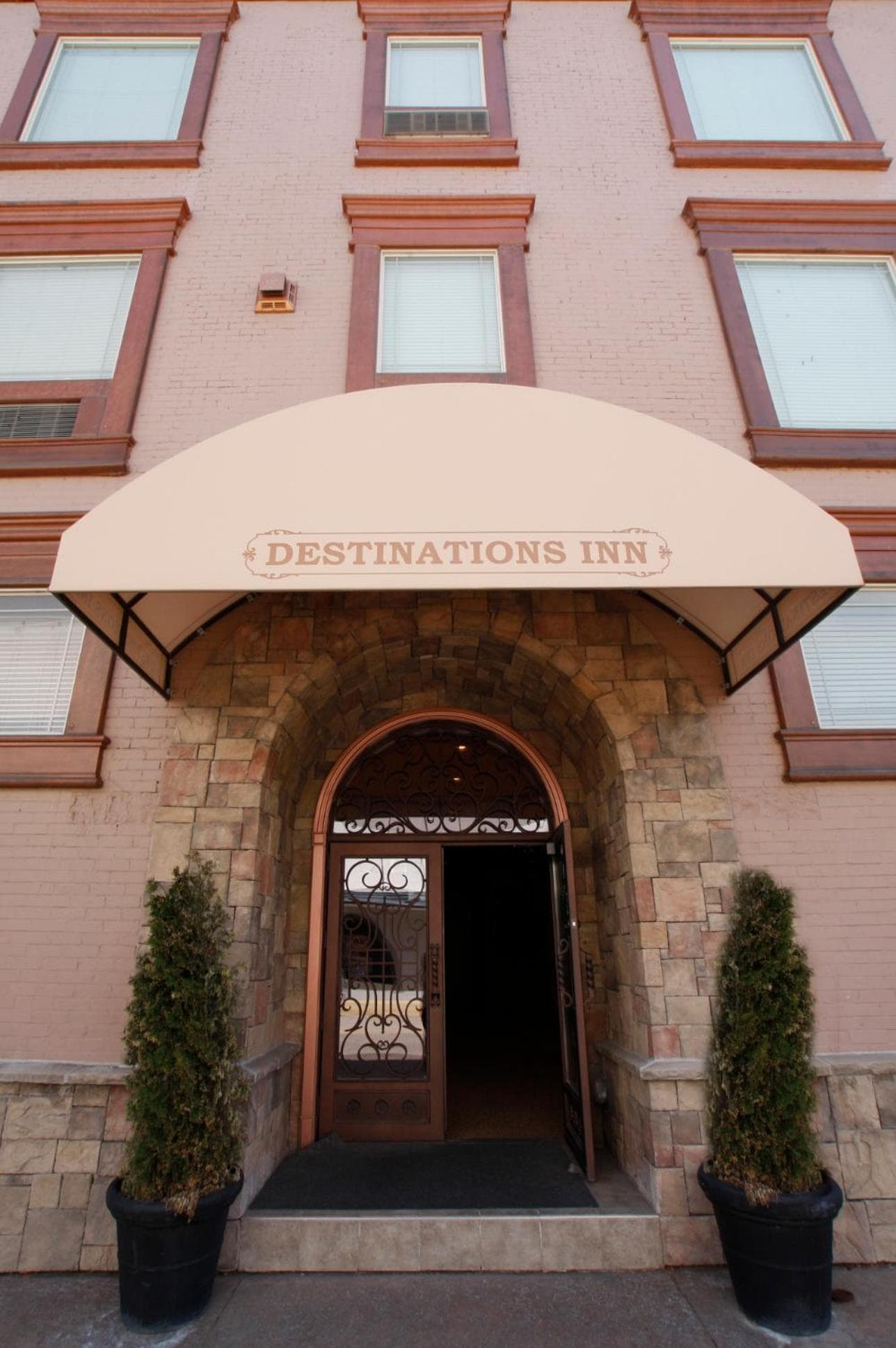 Destinations Inn Theme Rooms featured exterior or lobby in Idaho Falls, ID — similar hotel