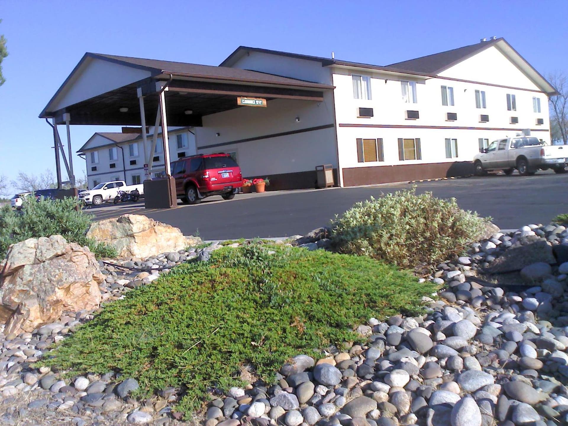 Colstrip Inn & Suites featured exterior or lobby in Colstrip, MT — similar hotel