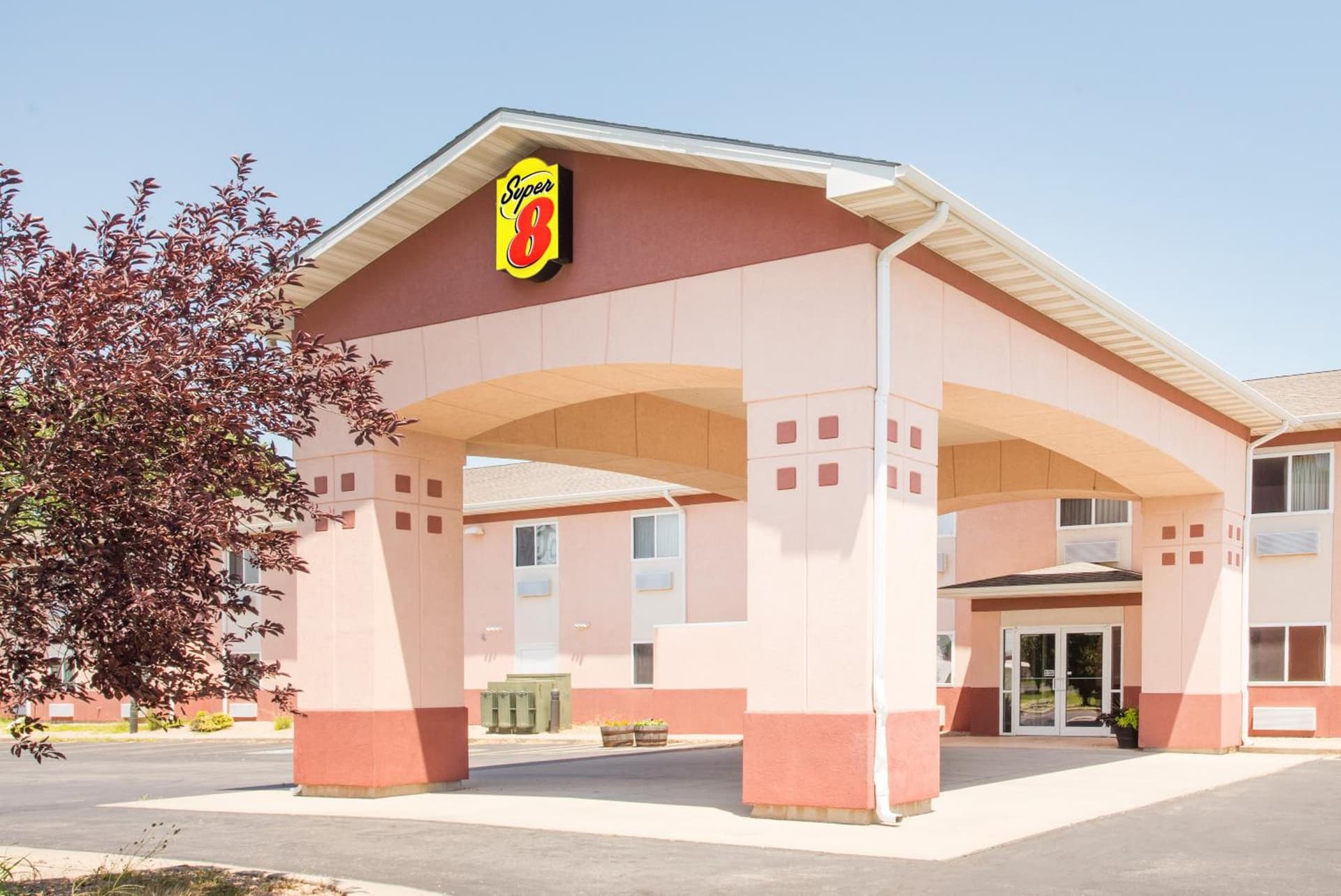 Super 8 by Wyndham Iola KS featured exterior or lobby in Iola, KS — similar hotel