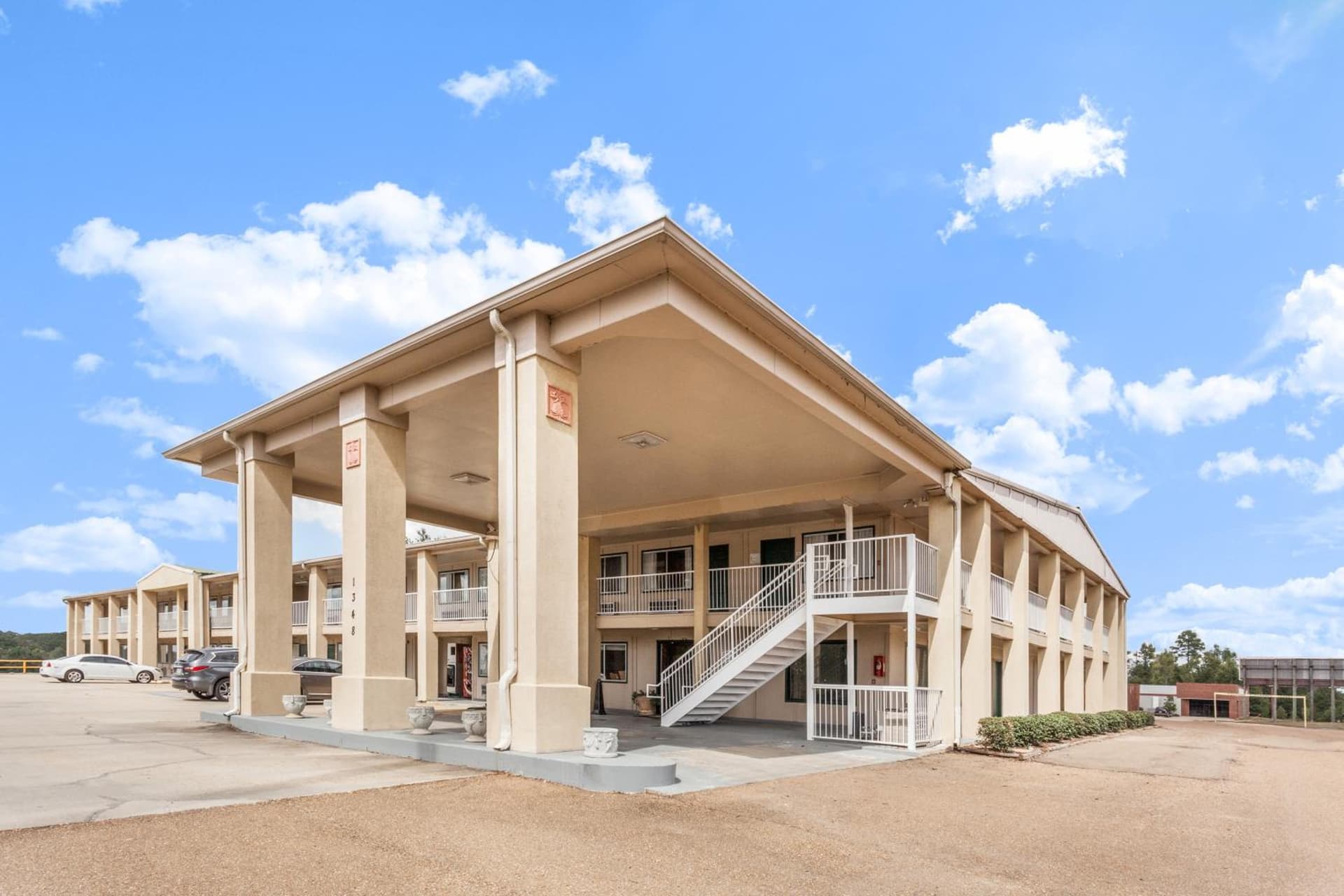 Super 8 by Wyndham Brookhaven featured exterior or lobby in Brookhaven, MS — similar hotel