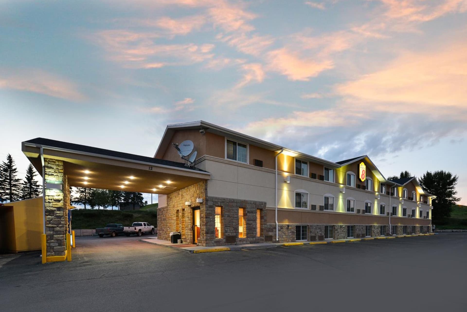 Super 8 by Wyndham Minot Airport featured exterior or lobby in Minot, ND — similar hotel
