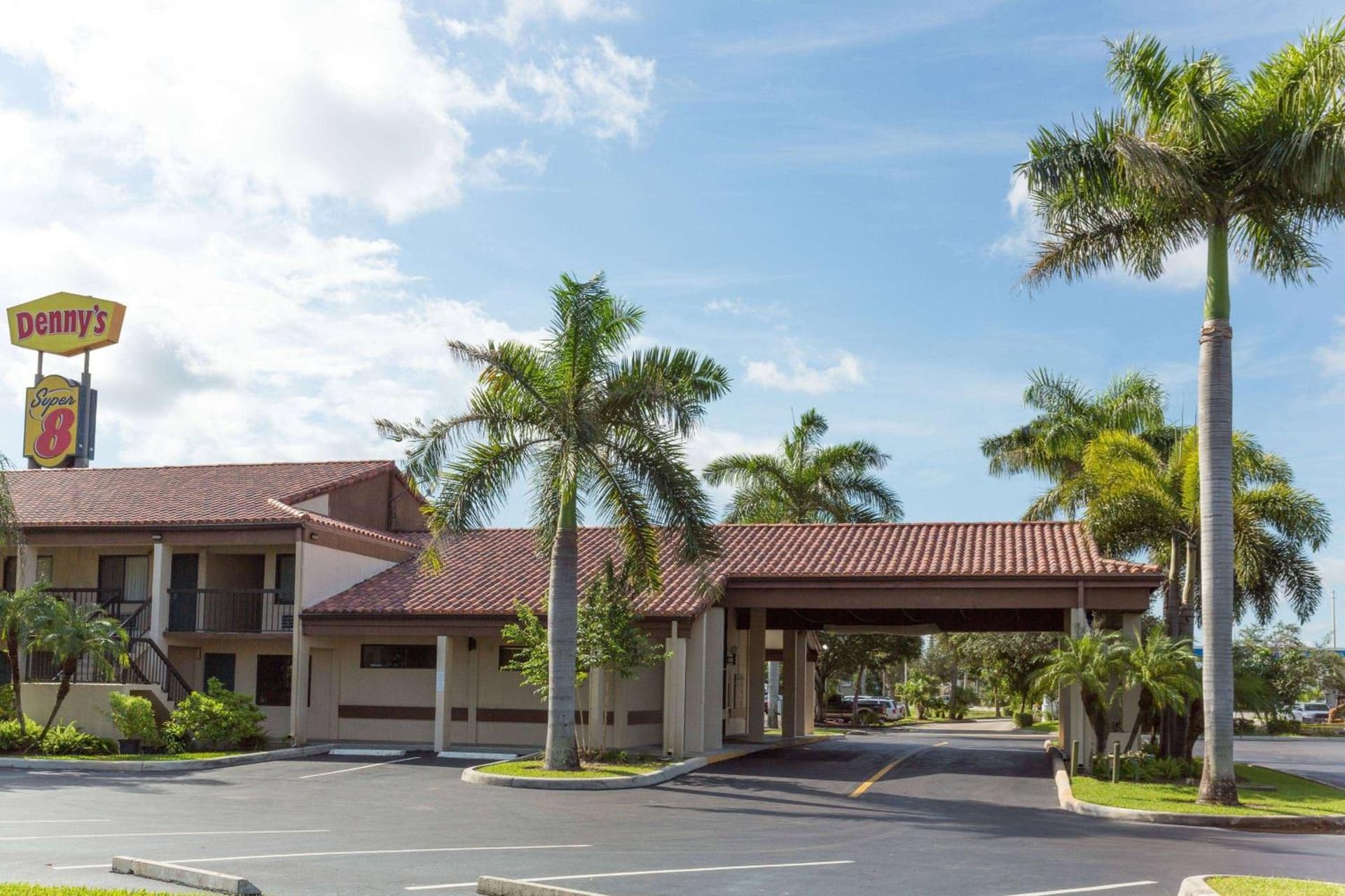 Super 8 by Wyndham Riviera Beach West Palm Beach featured exterior or lobby in Riviera Beach, FL — similar hotel