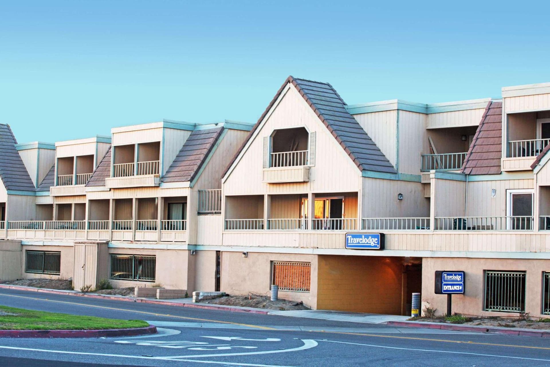 Travelodge by Wyndham Ocean Front exterior or lobby in Sunset Beach, CA — main listing photo