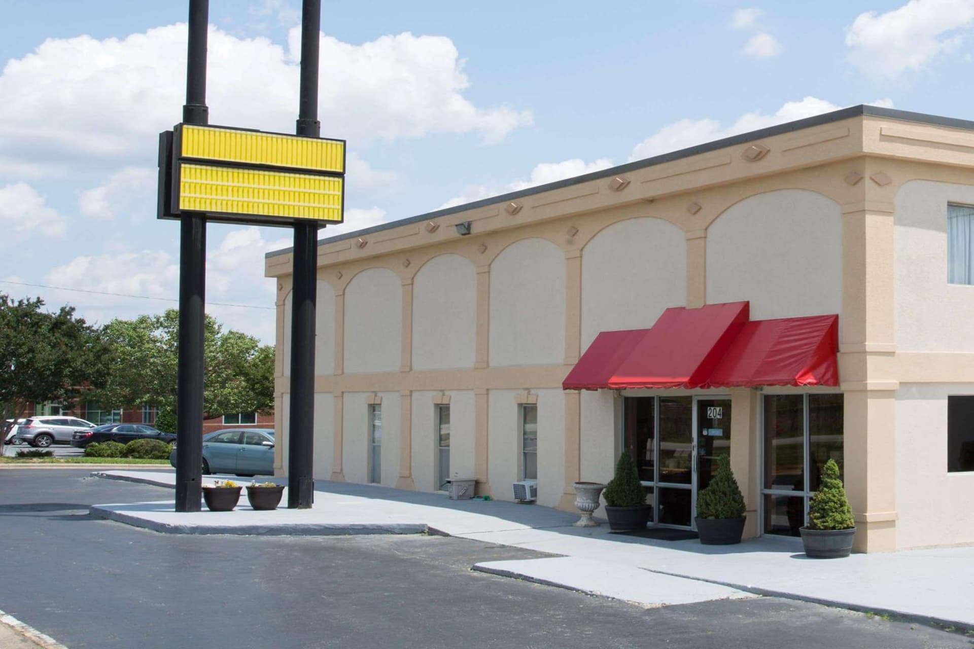 Super 8 by Wyndham Greensboro featured exterior or lobby in Greensboro, NC — similar hotel