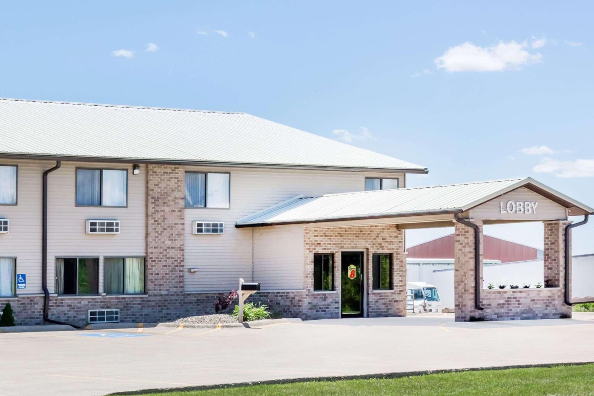 Super 8 by Wyndham Jefferson featured exterior or lobby in Jefferson, IA — similar hotel