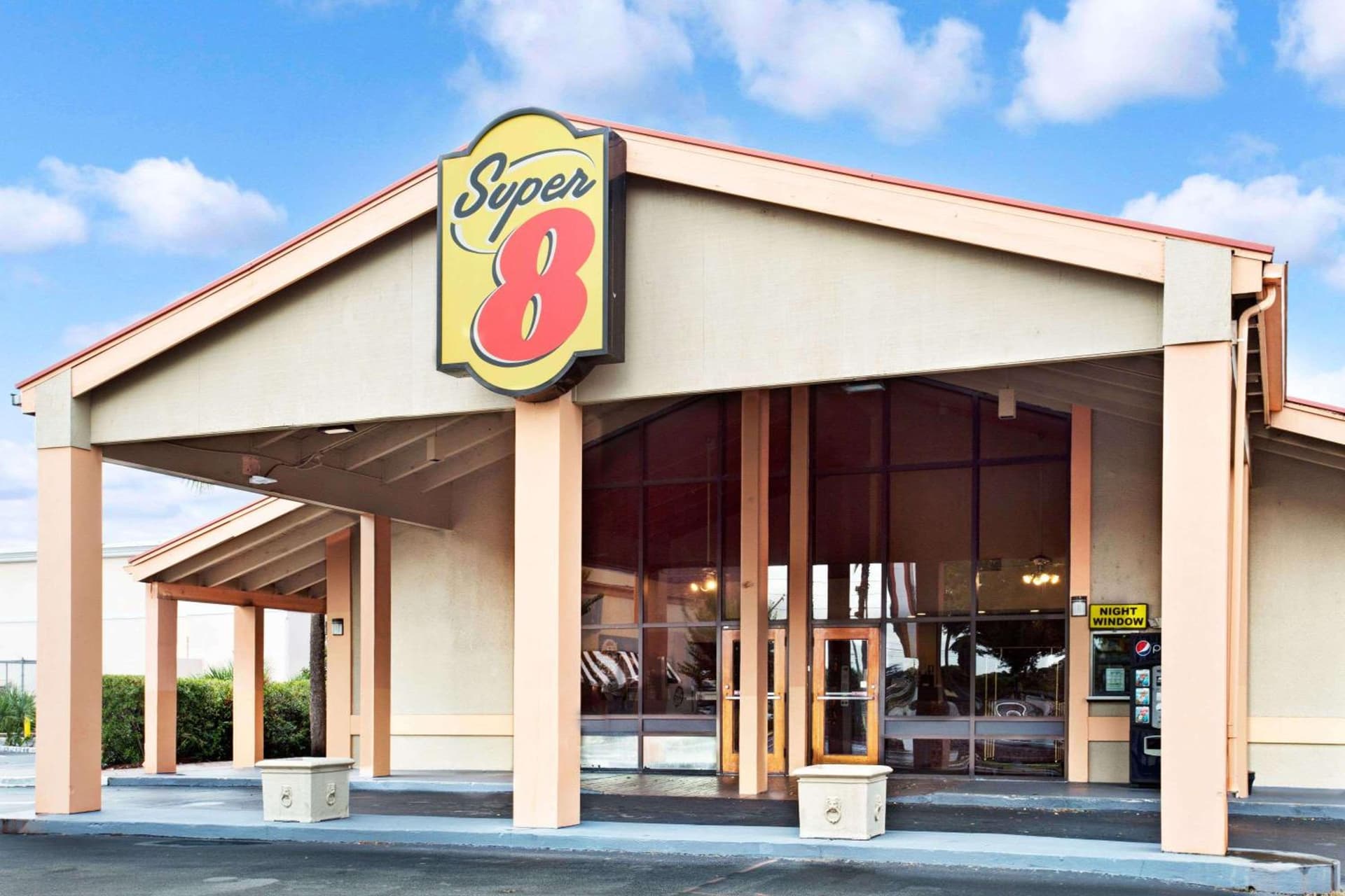 Super 8 by Wyndham Kissimmee/Maingate/Orlando Area featured exterior or lobby in Orlando, FL — similar hotel