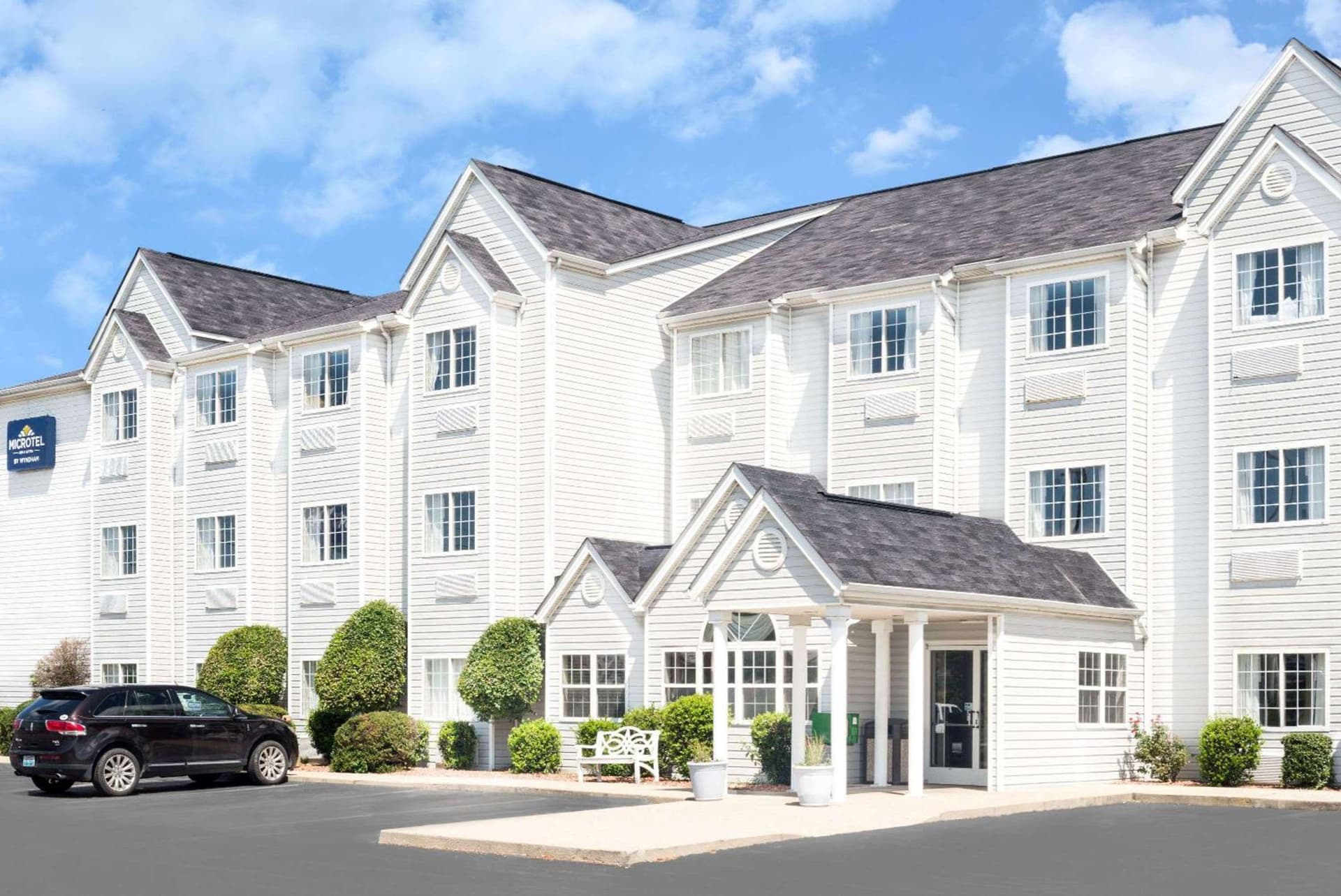 Microtel Inn & Suites by Wyndham London featured exterior or lobby in London, KY — similar hotel