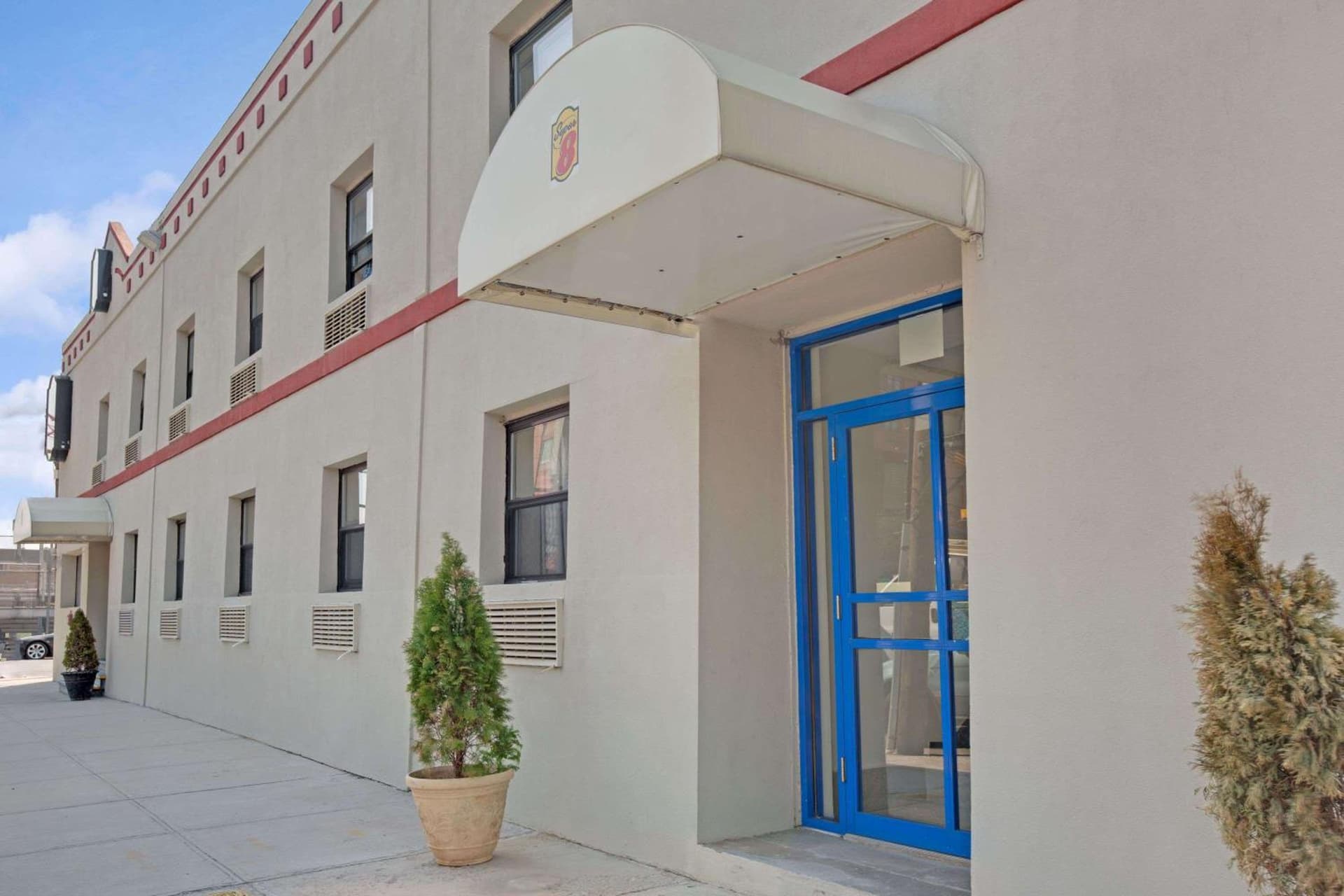 Super 8 by Wyndham Long Island City LGA Hotel featured exterior or lobby in Queens, NY — similar hotel