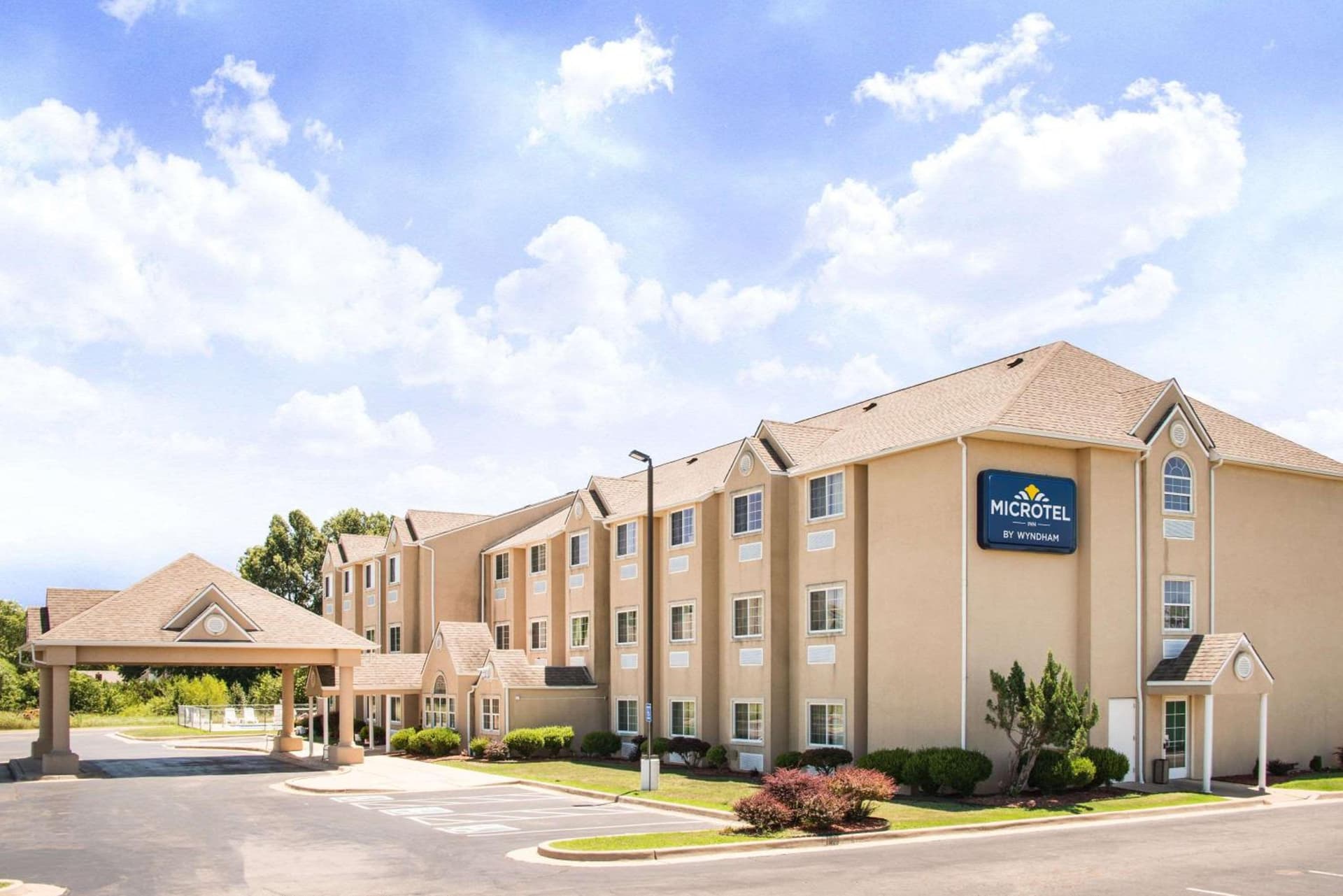 Microtel Inn & Suites Claremore Route 66 featured exterior or lobby in Claremore, OK — similar hotel