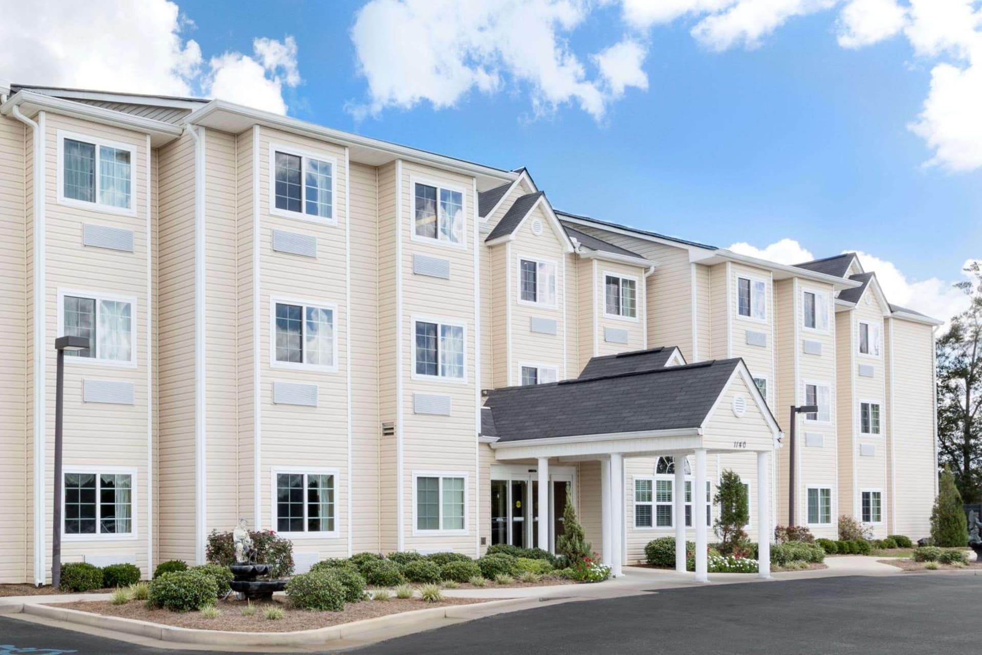 Microtel Inn & Suites by Wyndham Ozark featured exterior or lobby in Ozark, AL — similar hotel