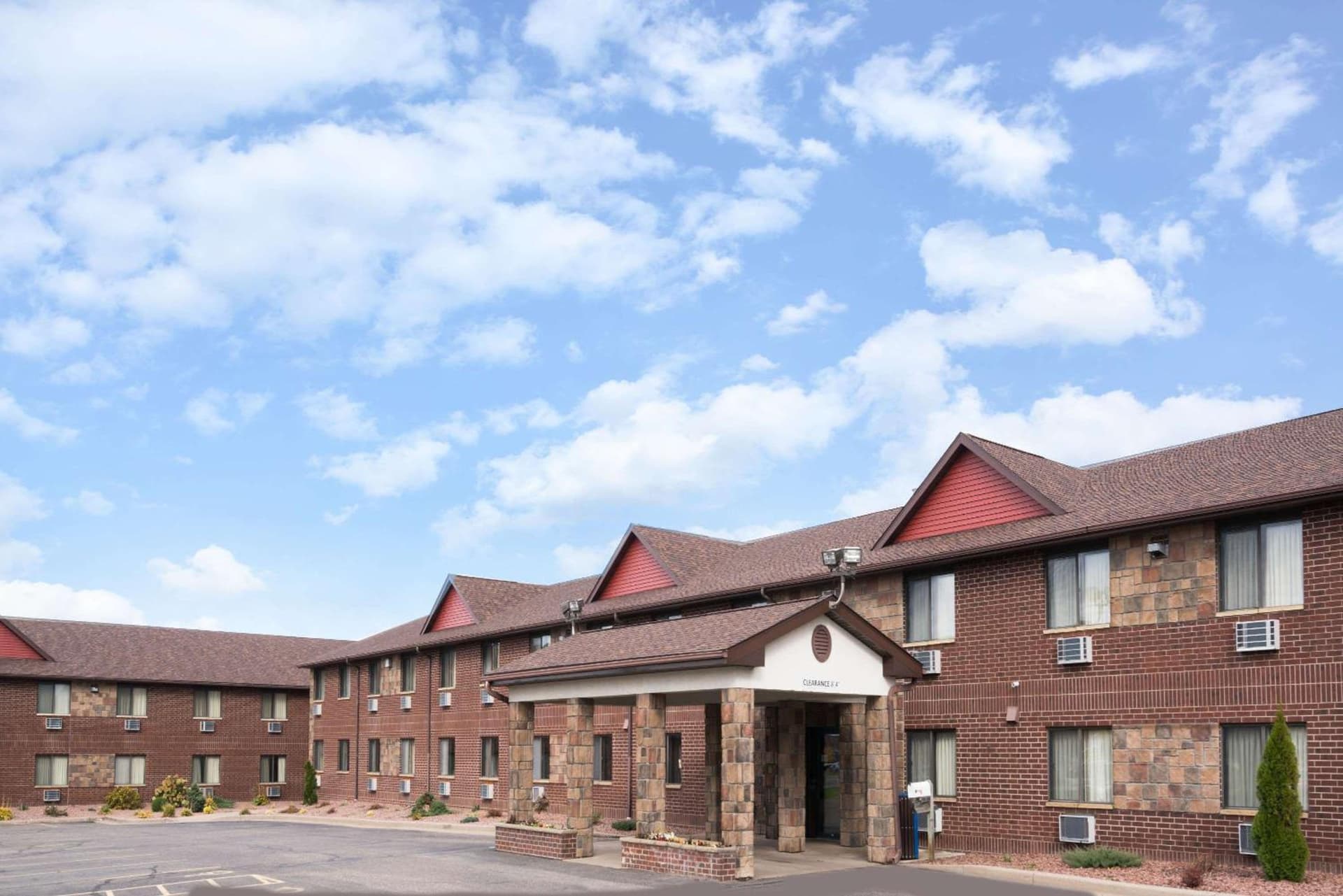 Baymont by Wyndham Eau Claire WI featured exterior or lobby in Eau Claire, WI — similar hotel
