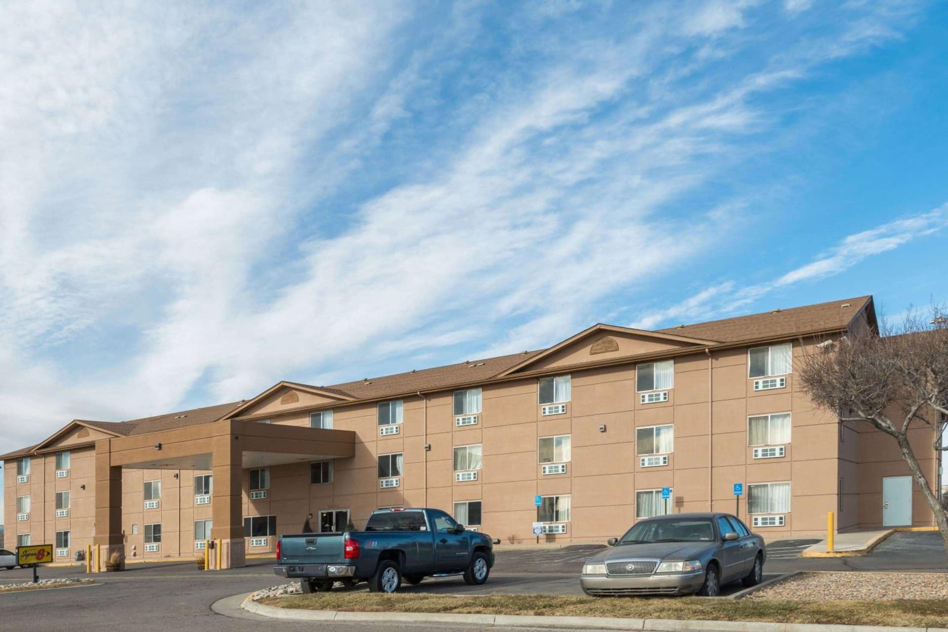 Super 8 by Wyndham Henderson North East Denver featured exterior or lobby in Henderson, CO — similar hotel