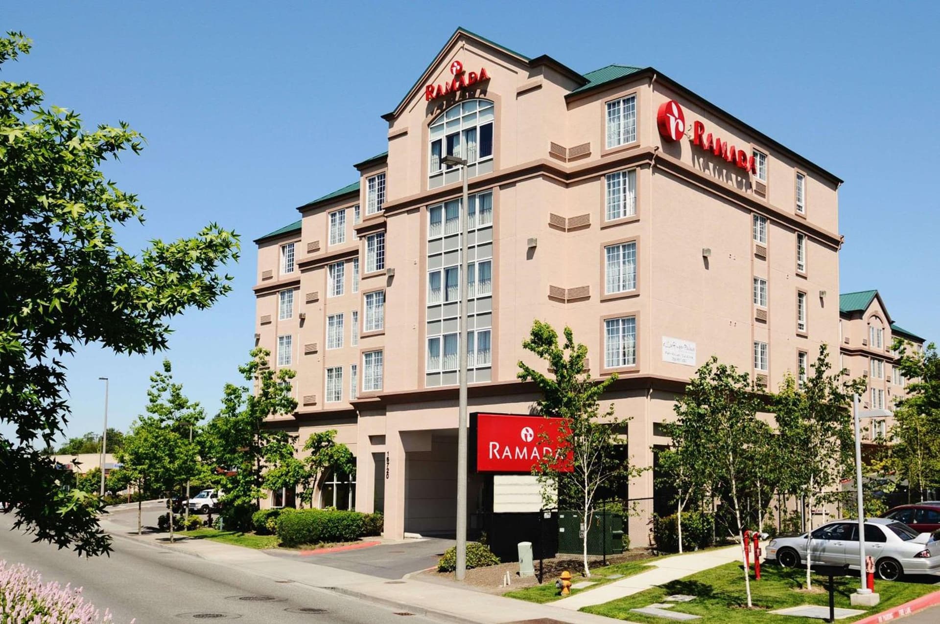 Ramada by Wyndham SeaTac Airport featured exterior or lobby in SeaTac, WA — similar hotel