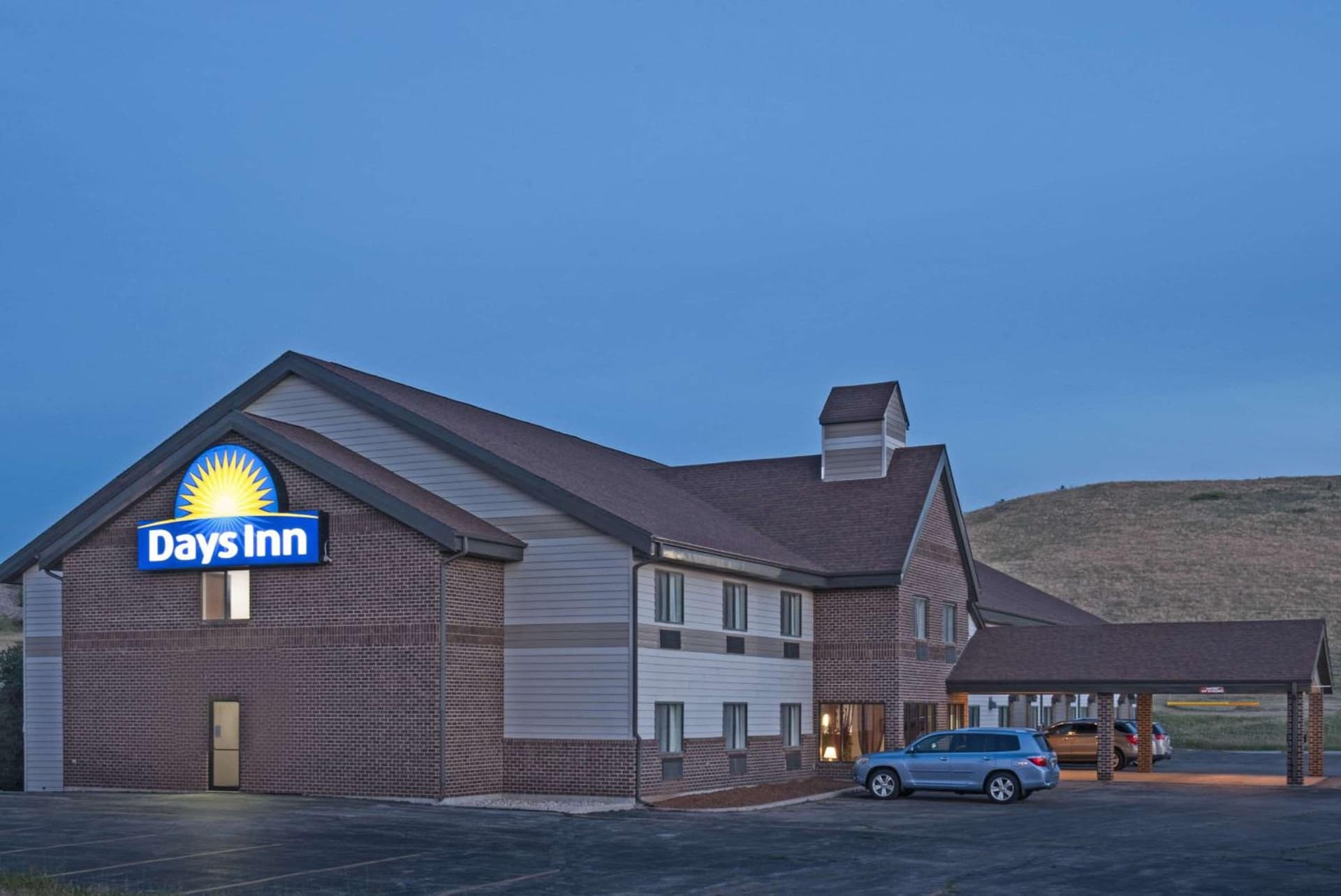 Days Inn by Wyndham Sturgis SOUTHDAKOTA featured exterior or lobby in Sturgis, SD — similar hotel