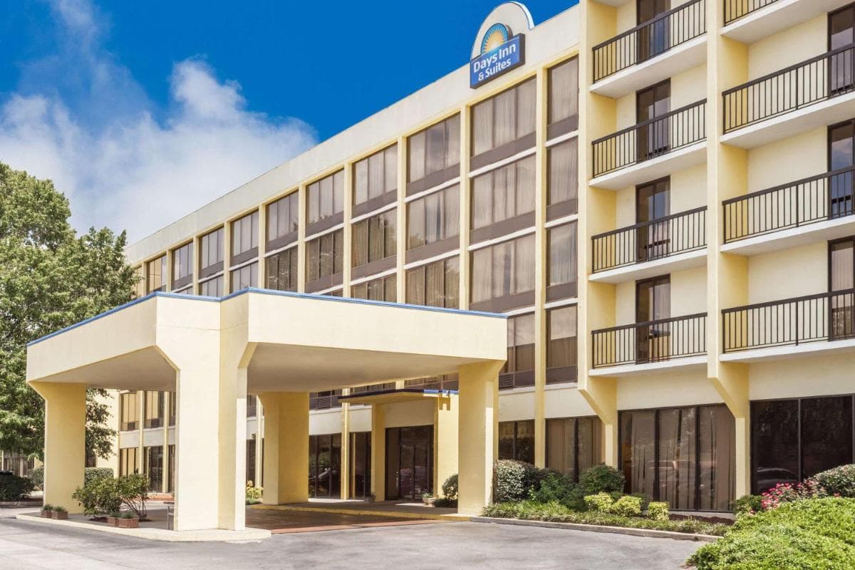 Days Inn & Suites by Wyndham SE Columbia Ft Jackson featured exterior or lobby in Columbia, SC — similar hotel