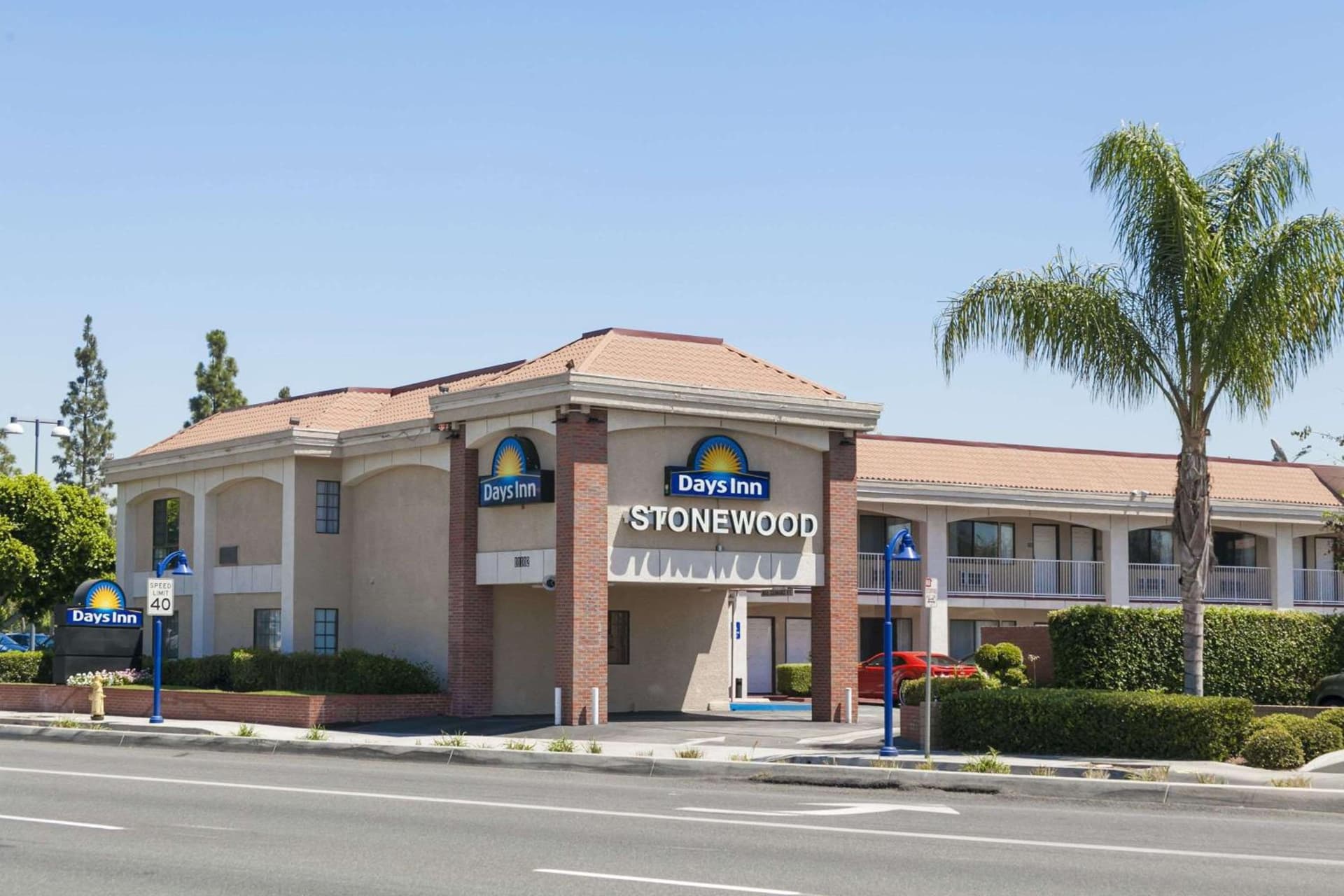 Days Inn by Wyndham Downey featured exterior or lobby in Downey, CA — similar hotel
