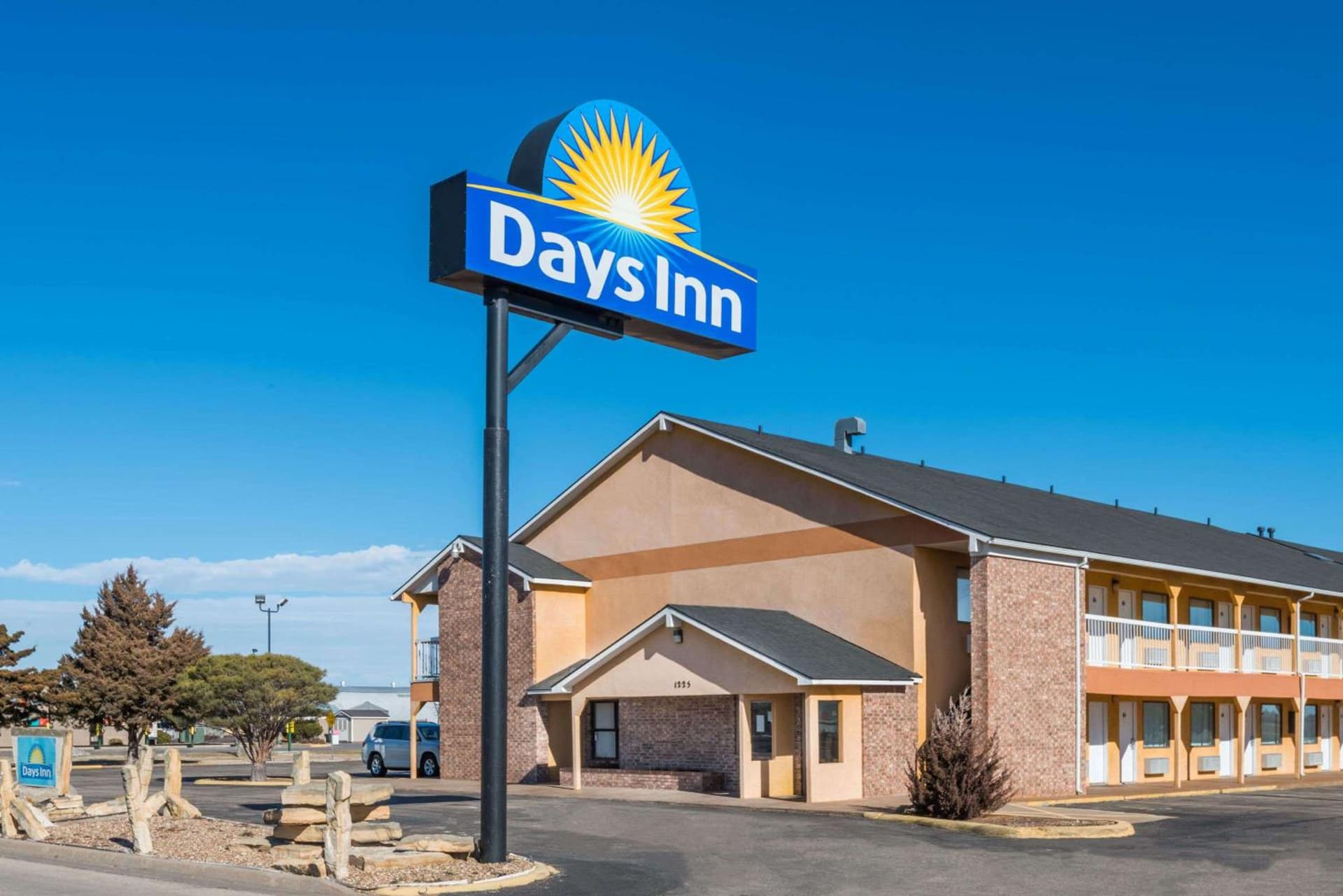 Days Inn by Wyndham Russell featured exterior or lobby in Russell, KS — similar hotel