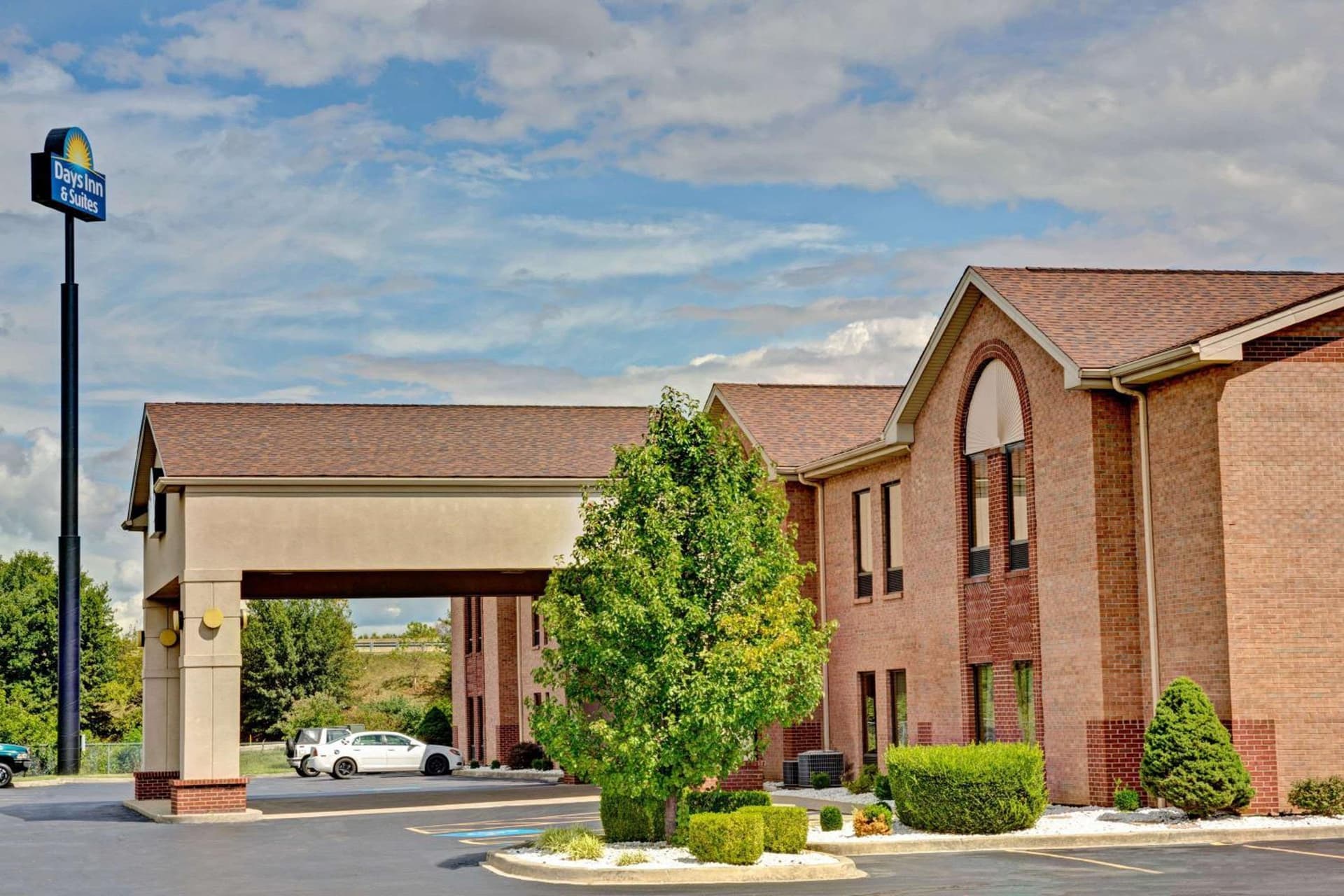 Days Inn & Suites by Wyndham Louisville SW featured exterior or lobby in Louisville, KY — similar hotel