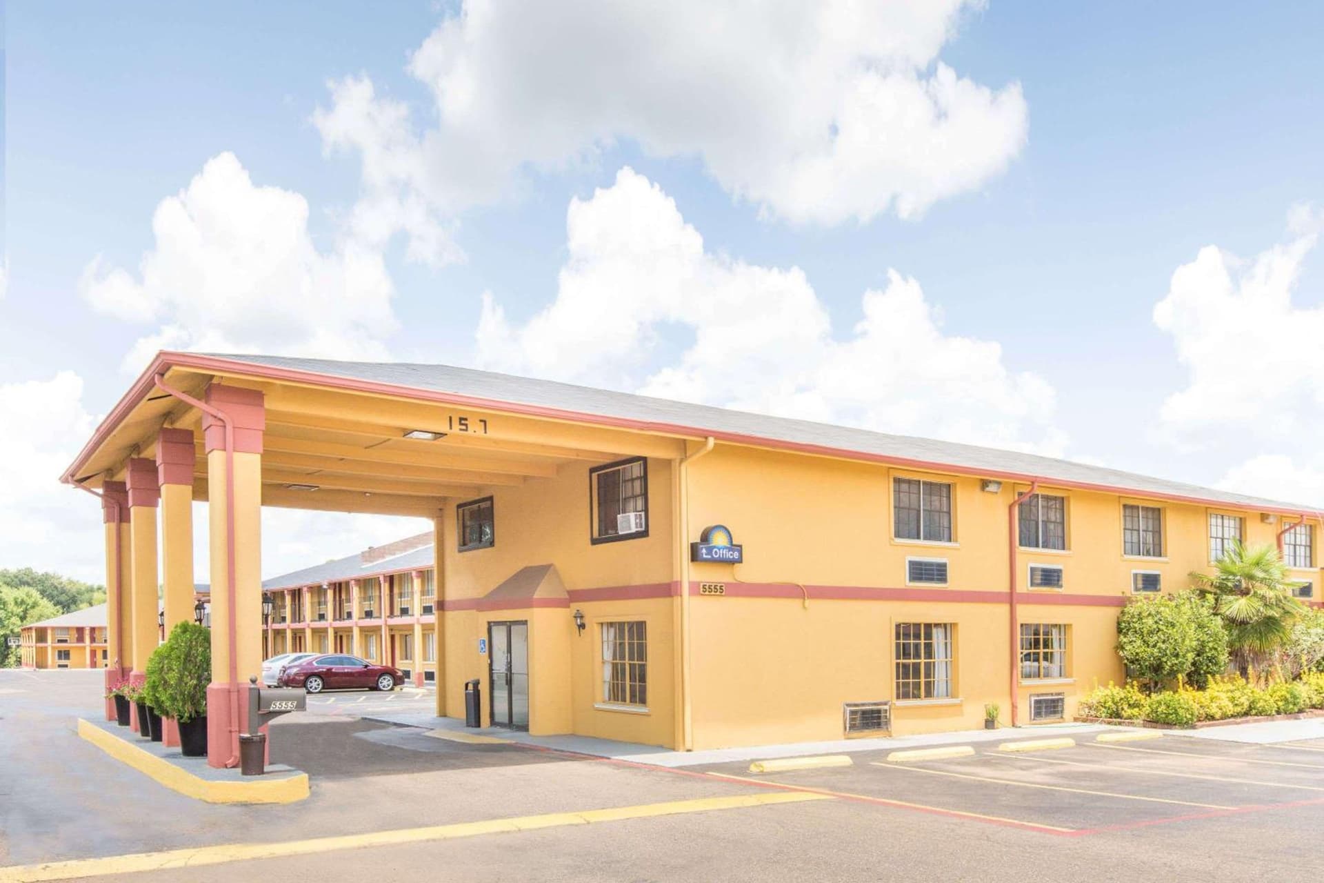 Executive Inn & Suites featured exterior or lobby in Marshall, TX — similar hotel