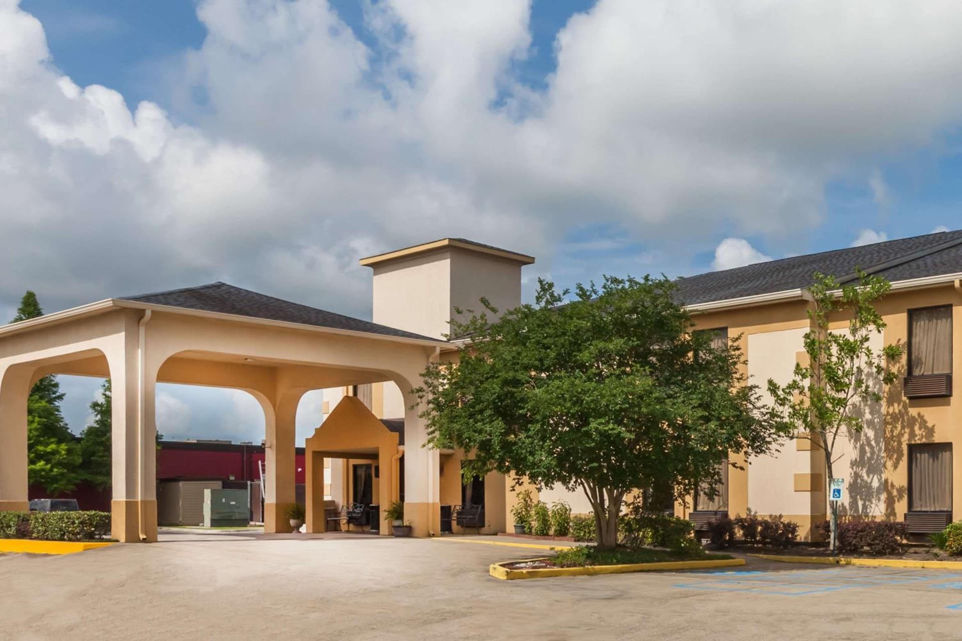 Days Inn & Suites by Wyndham New Iberia featured exterior or lobby in New Iberia, LA — similar hotel