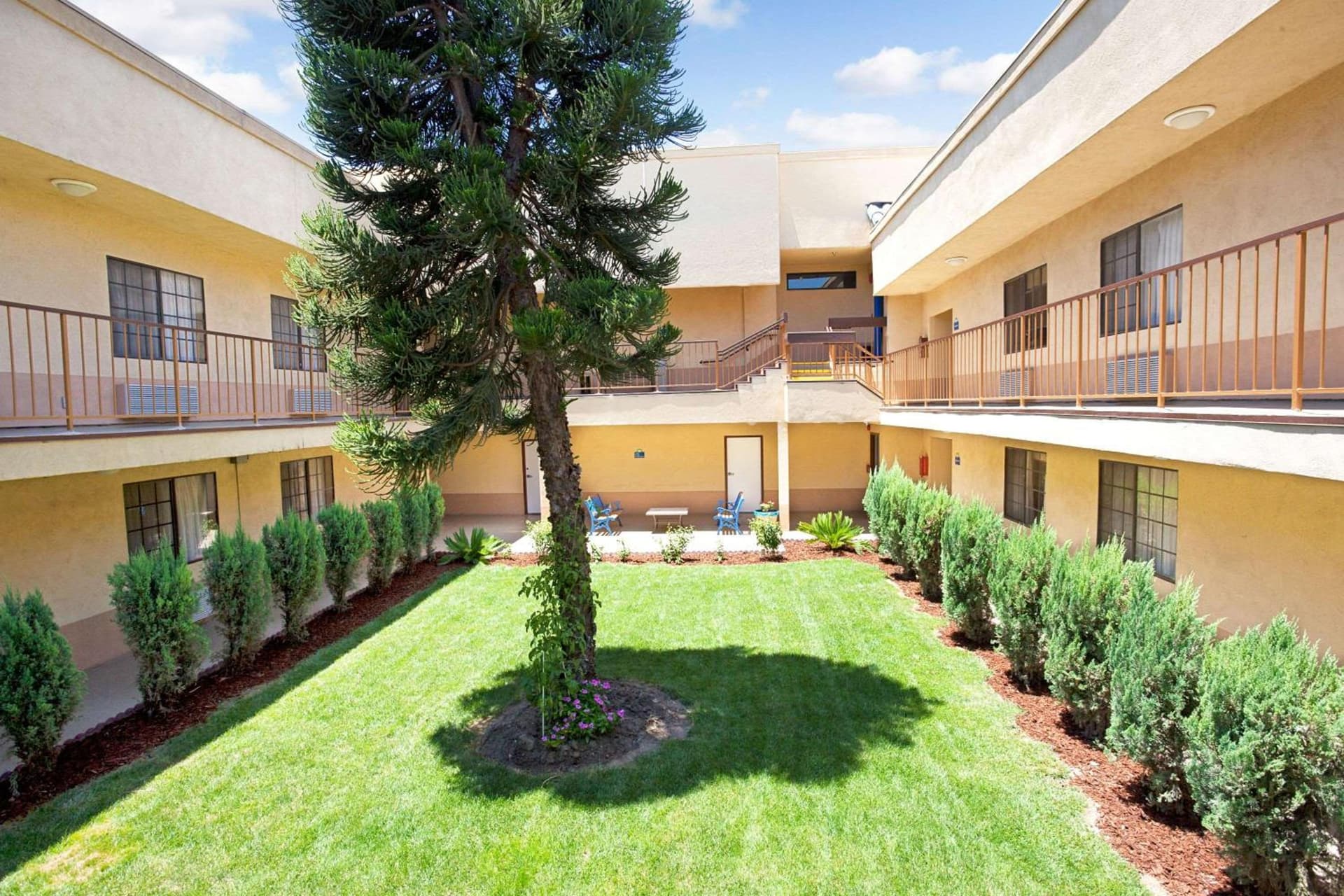Days Inn & Suites by Wyndham Artesia featured exterior or lobby in Artesia, CA — similar hotel
