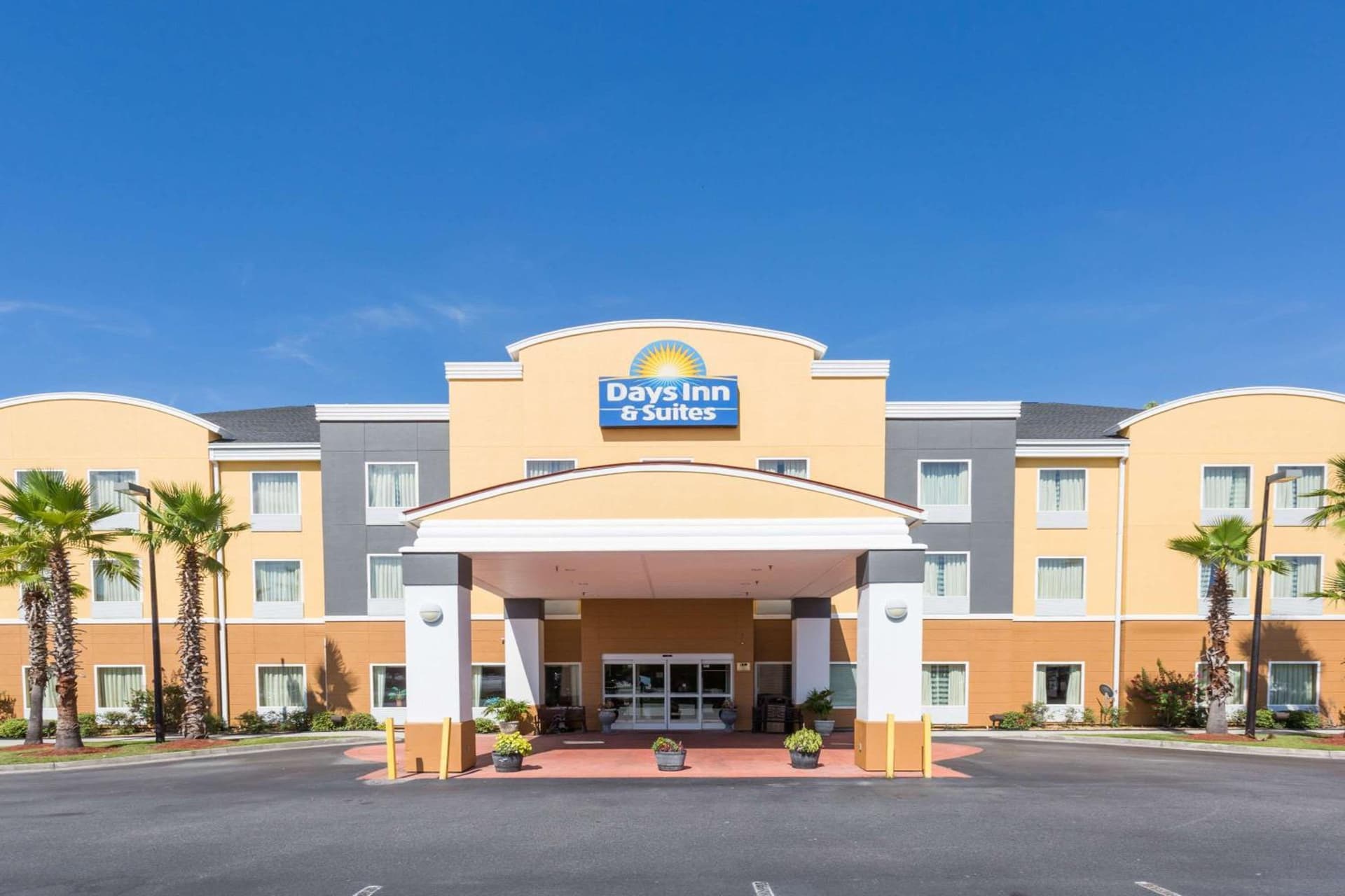 Days Inn & Suites by Wyndham Savannah North I-95 featured exterior or lobby in Port Wentworth, GA — similar hotel