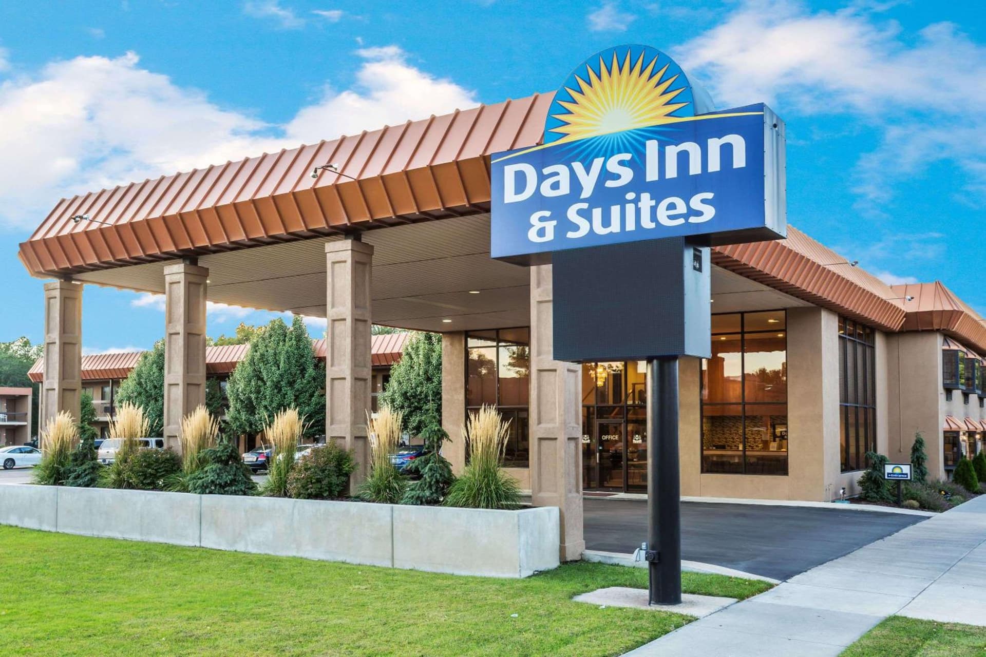 Days Inn & Suites by Wyndham Logan featured exterior or lobby in Logan, UT — similar hotel
