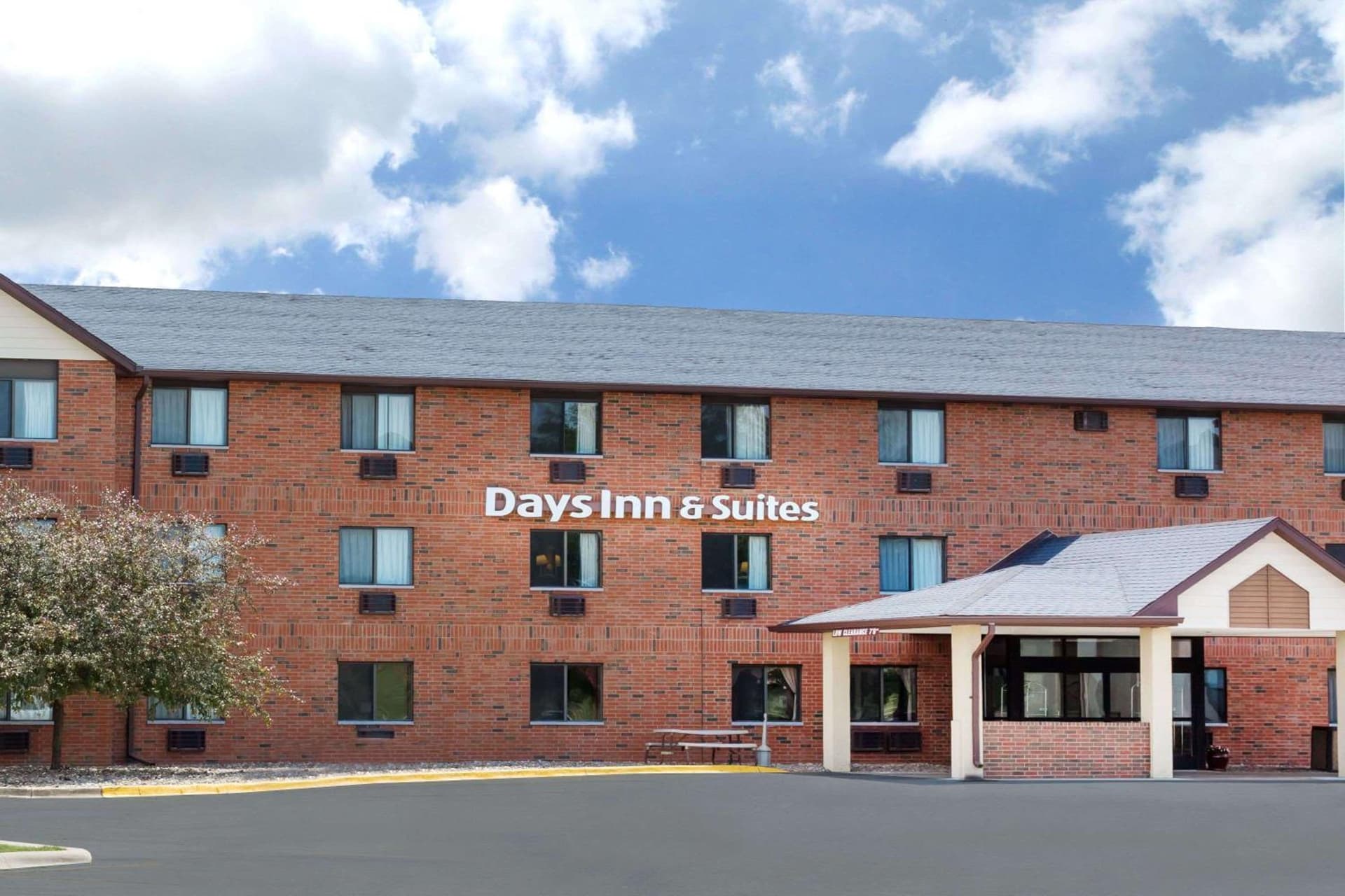 Days Inn & Suites by Wyndham Des Moines Airport featured exterior or lobby in Des Moines, IA — similar hotel