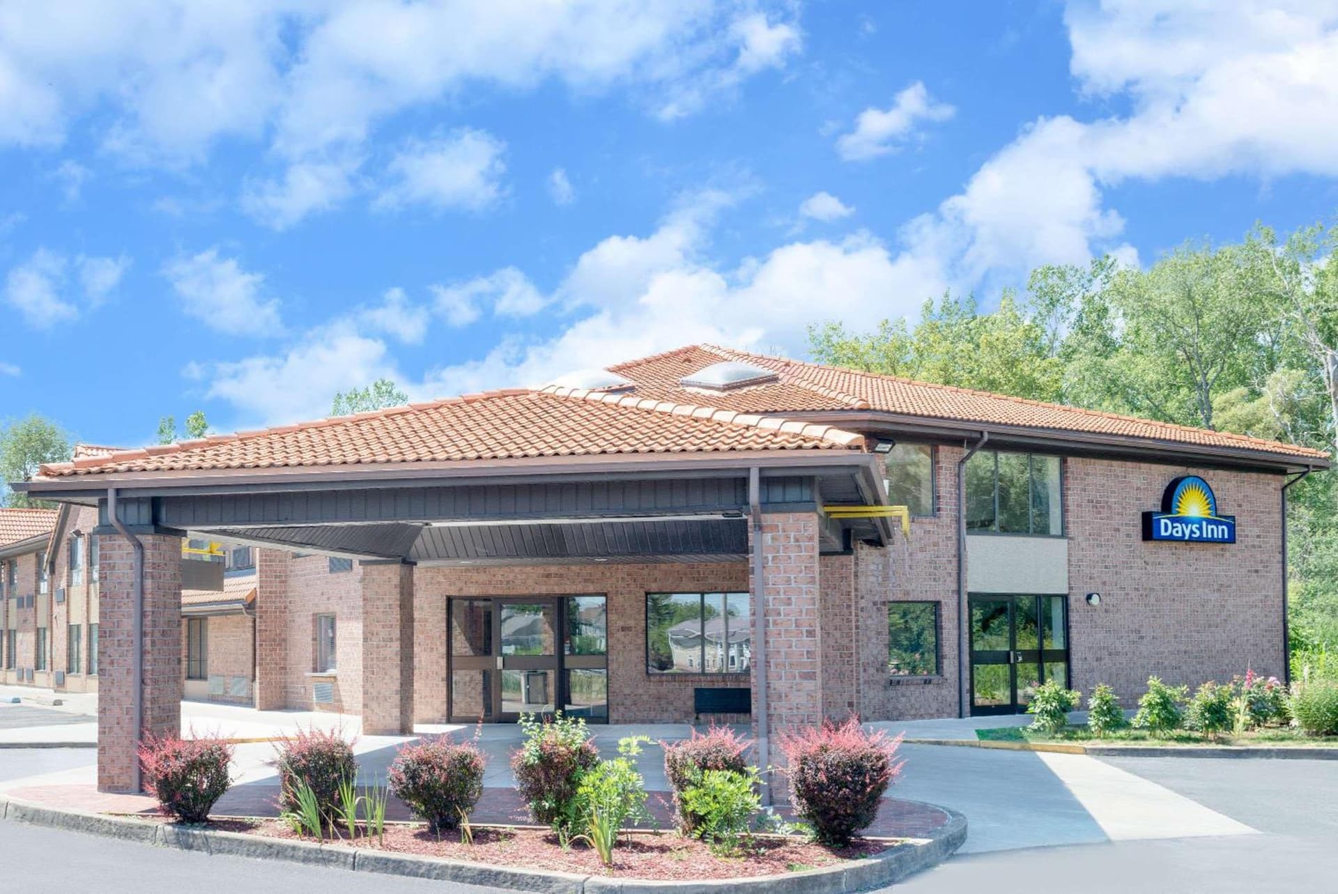 Days Inn by Wyndham Geneva/Finger Lakes featured exterior or lobby in Geneva, NY — similar hotel