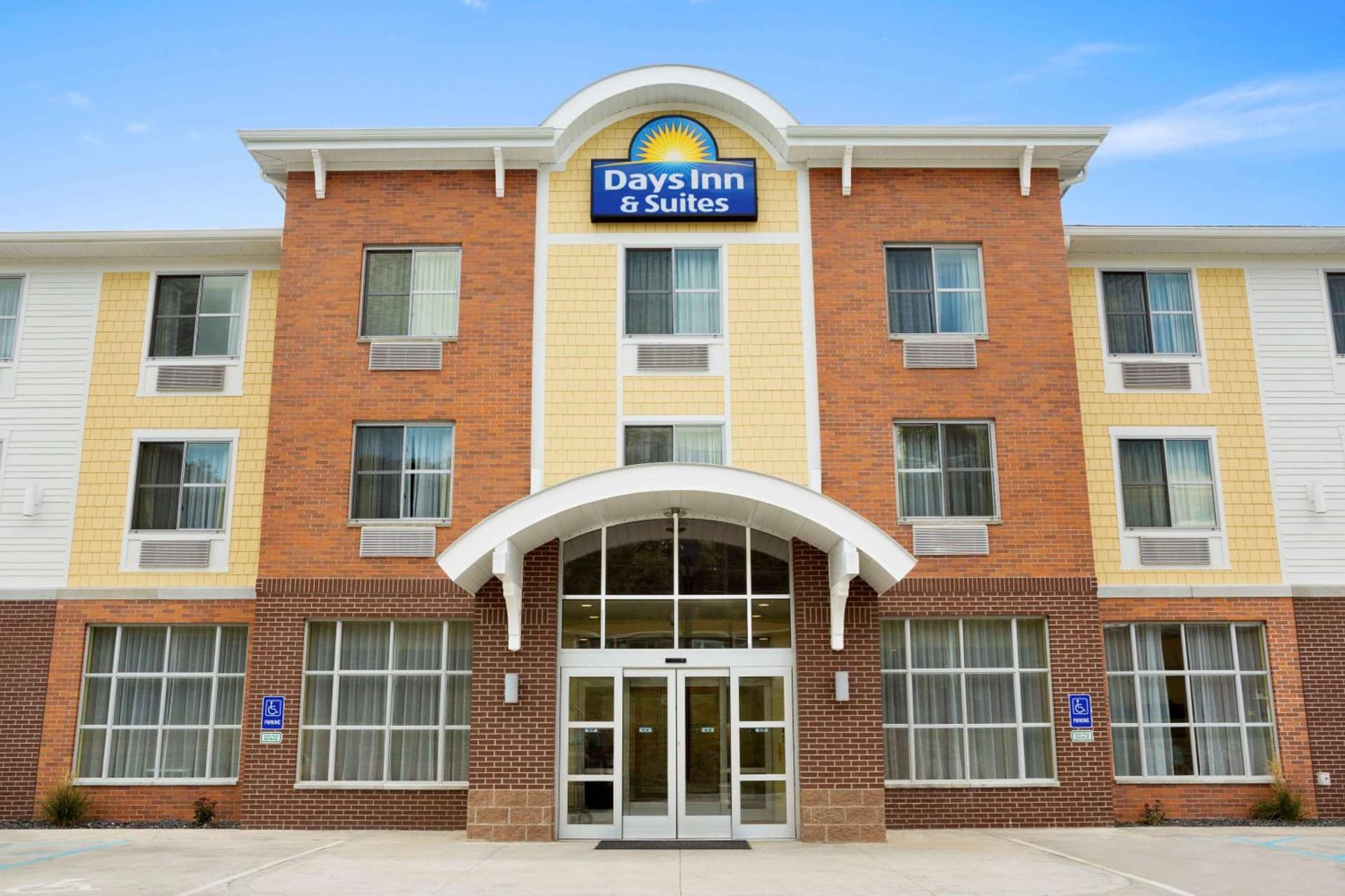 Days Inn & Suites by Wyndham Caldwell featured exterior or lobby in Caldwell, OH — similar hotel