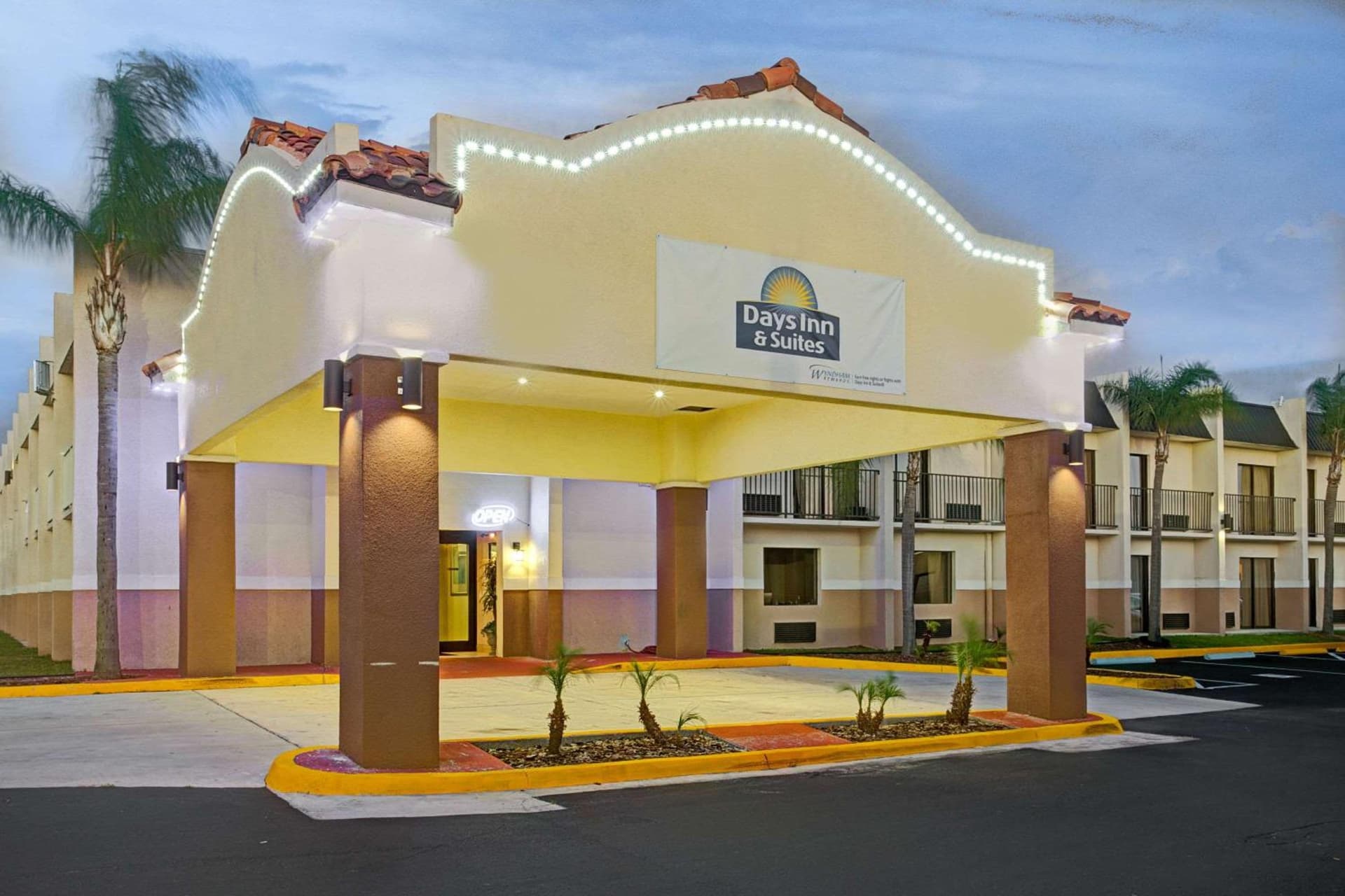 Days Inn & Suites by Wyndham Tampa Fairground-Casino-Ybor featured exterior or lobby in Tampa, FL — similar hotel
