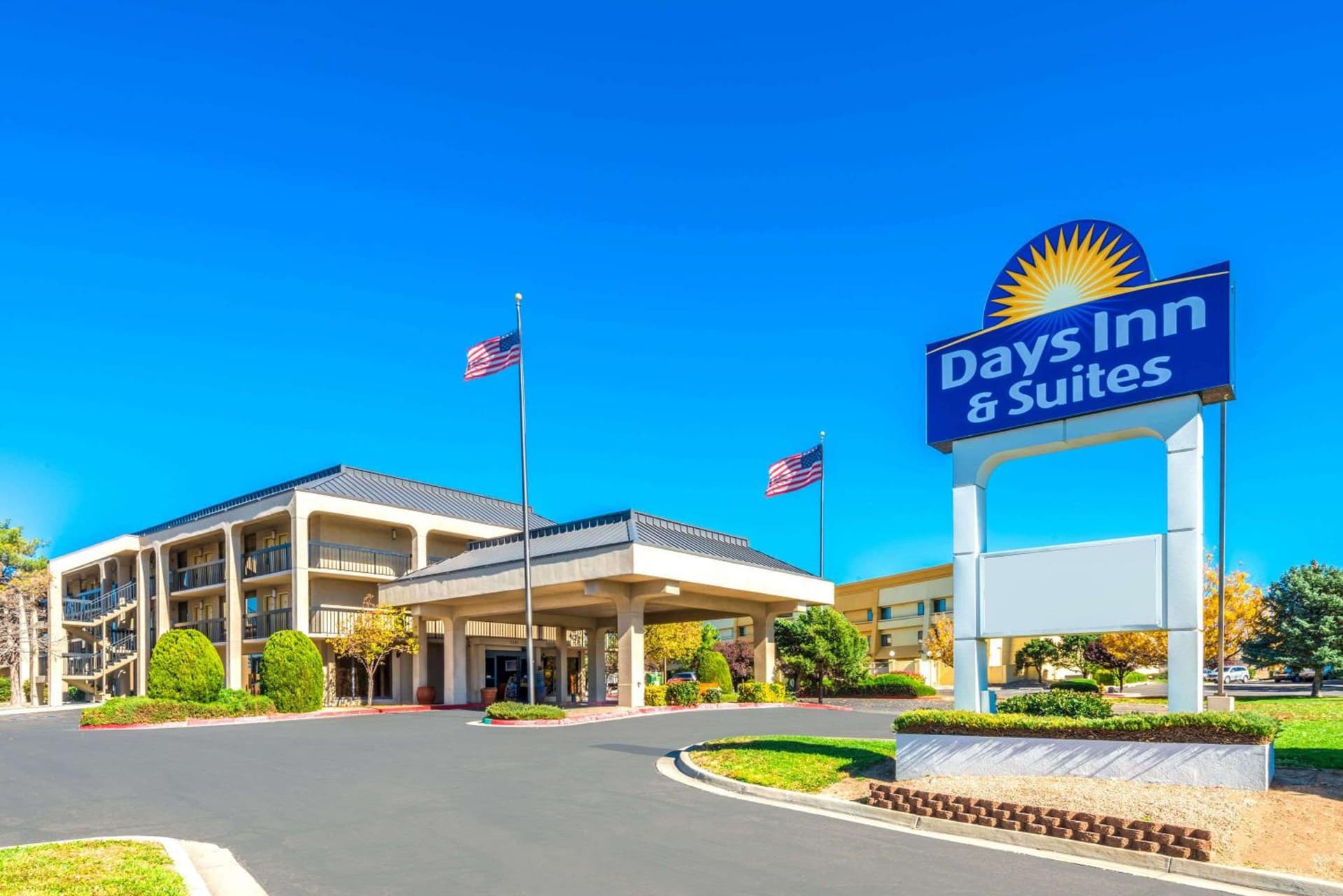 Days Inn & Suites by Wyndham Albuquerque North featured exterior or lobby in Albuquerque, NM — similar hotel