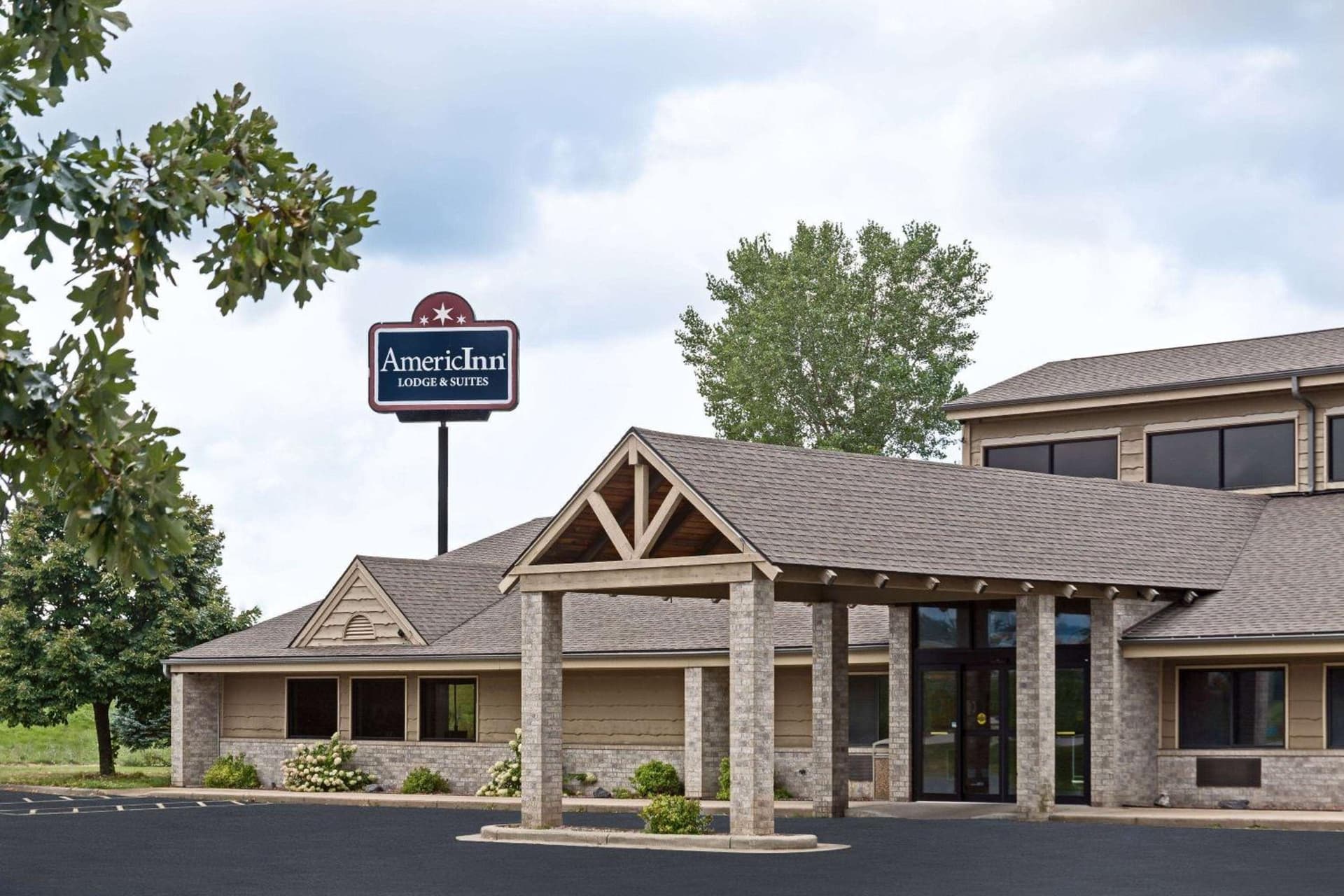 AmericInn by Wyndham Tomah featured exterior or lobby in Tomah, WI — similar hotel