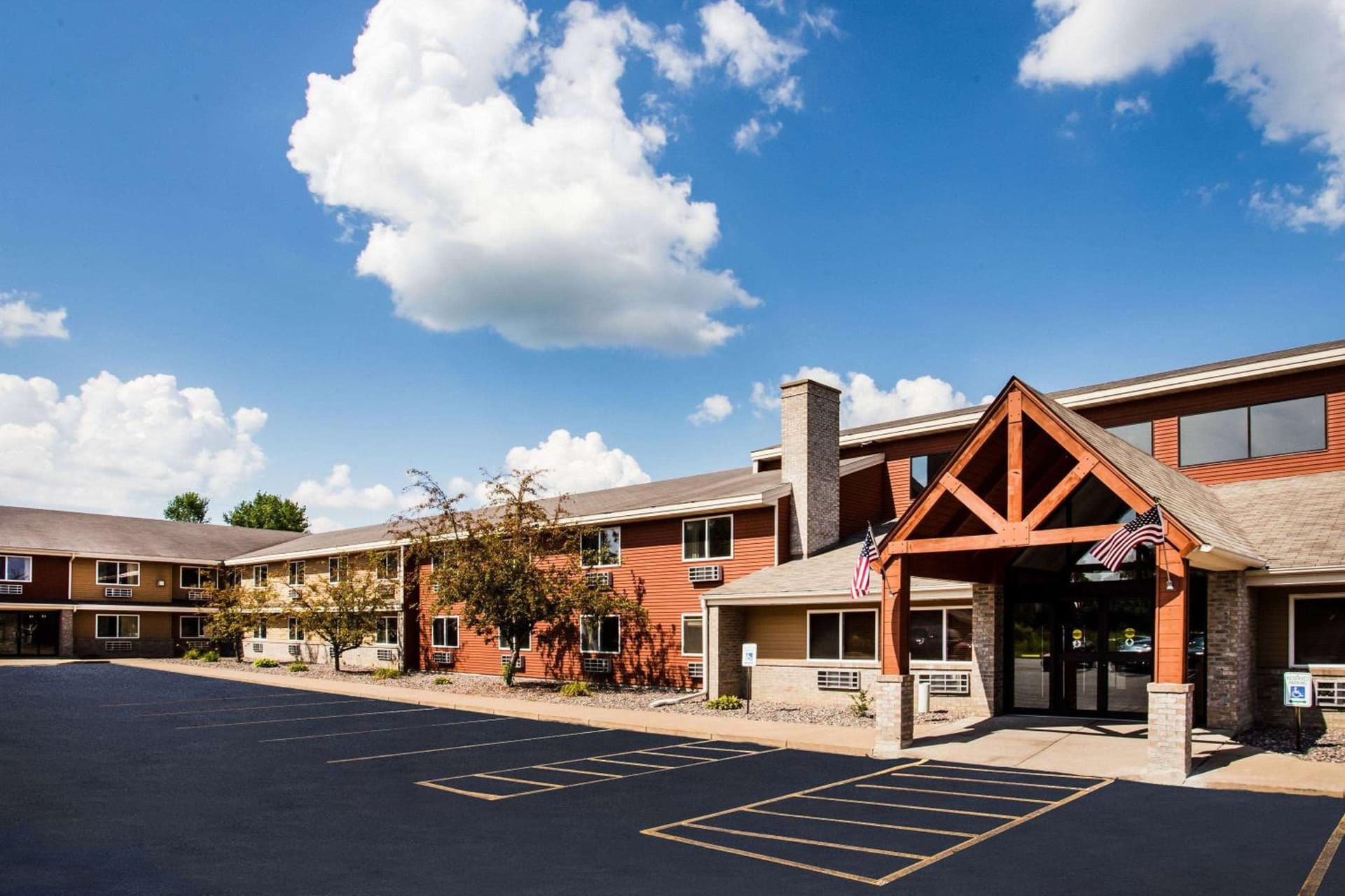 AmericInn by Wyndham Menomonie featured exterior or lobby in Menomonie, WI — similar hotel