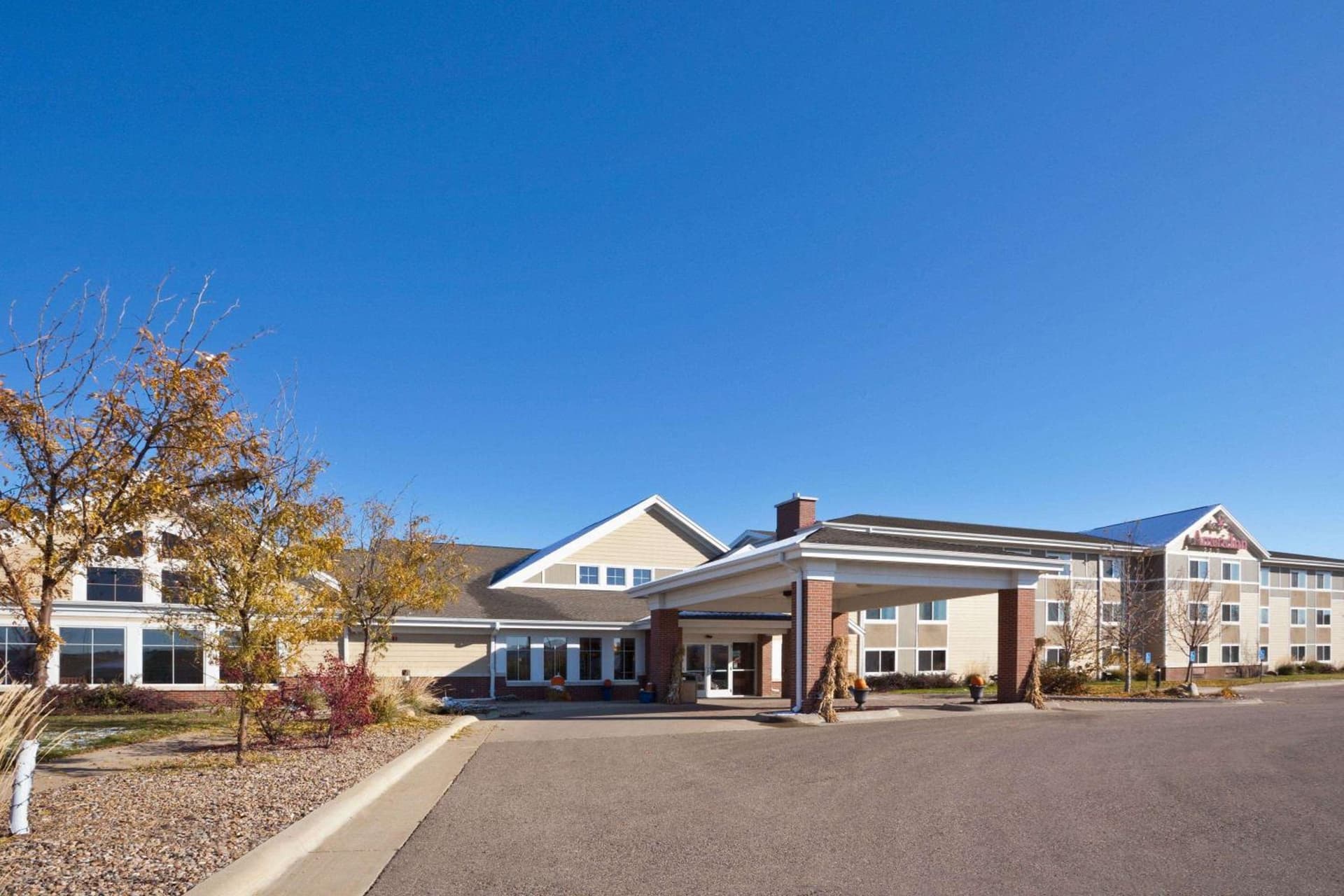 AmericInn by Wyndham Fort Pierre Conference Center featured exterior or lobby in Fort Pierre, SD — similar hotel