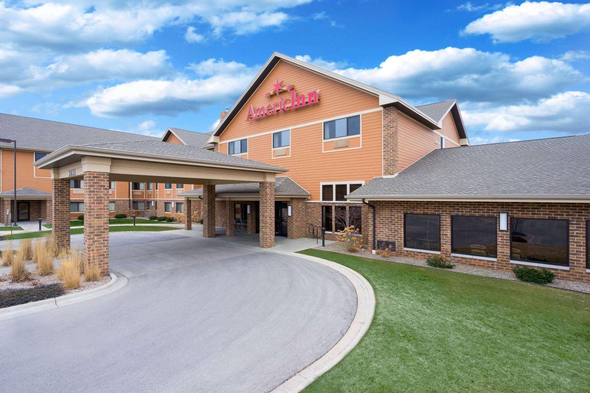 AmericInn by Wyndham Green Bay East featured exterior or lobby in Green Bay, WI — similar hotel