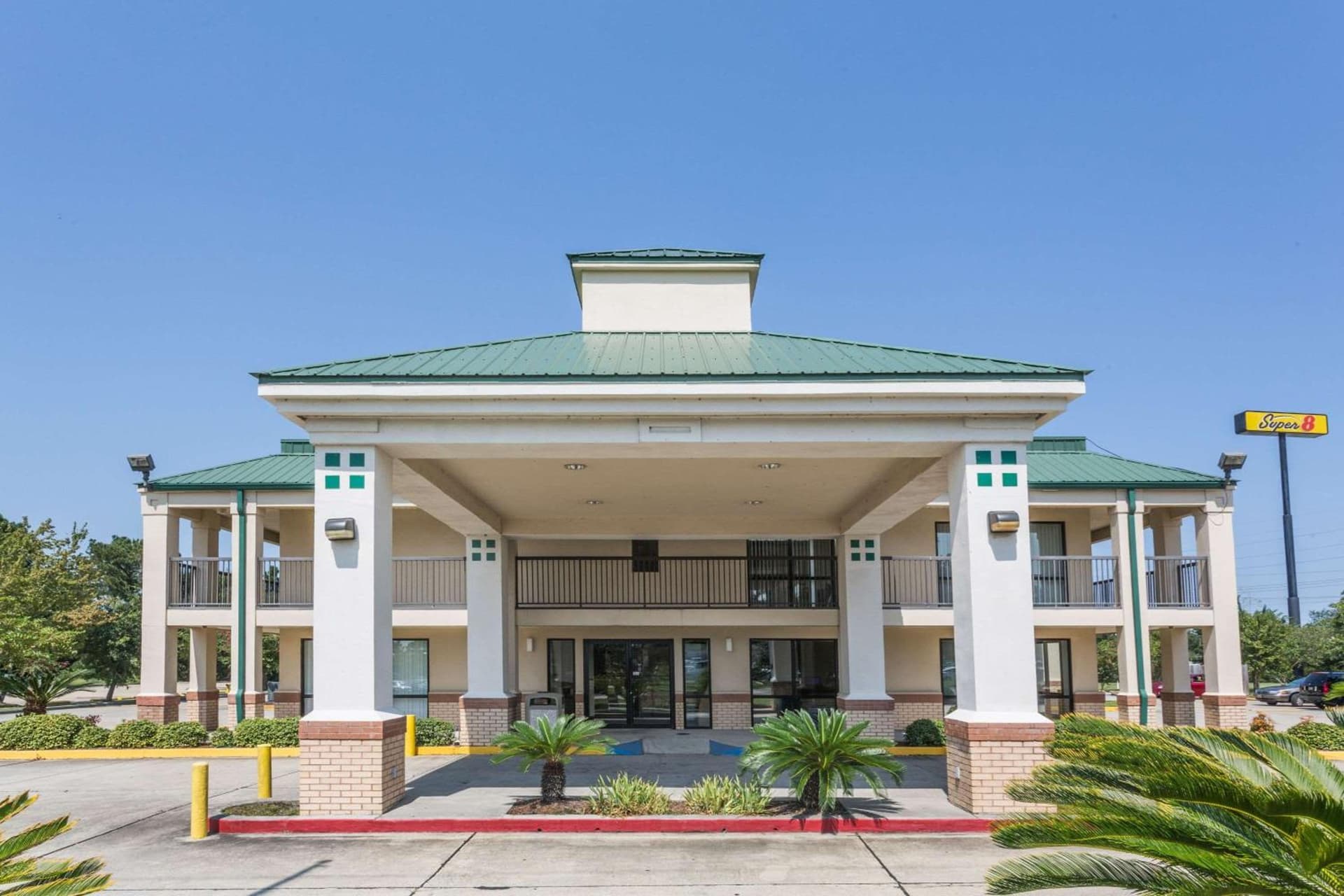Super 8 by Wyndham Slidell exterior or lobby in Slidell, LA — main listing photo