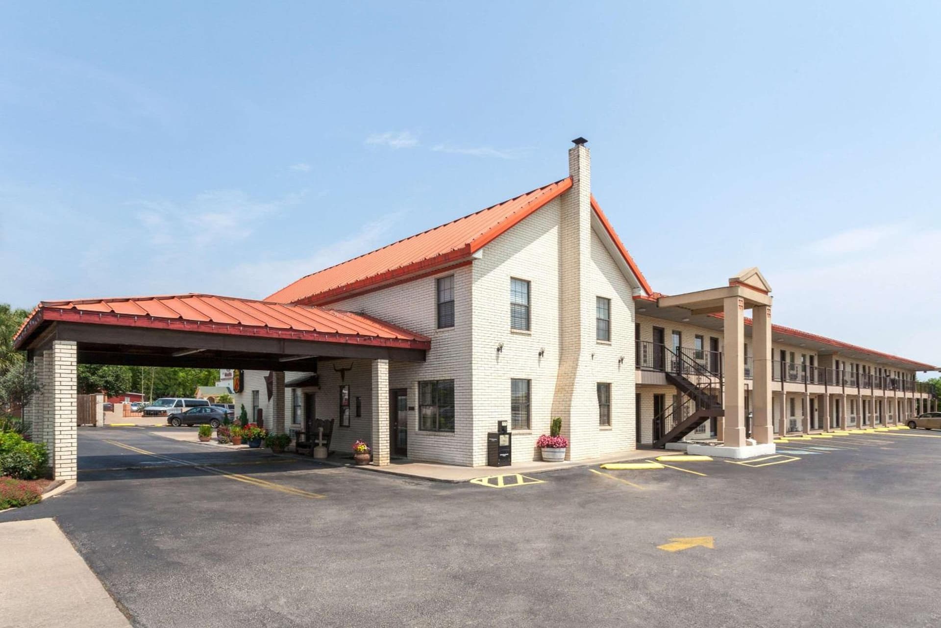 Super 8 by Wyndham Fredericksburg featured exterior or lobby in Fredericksburg, TX — similar hotel