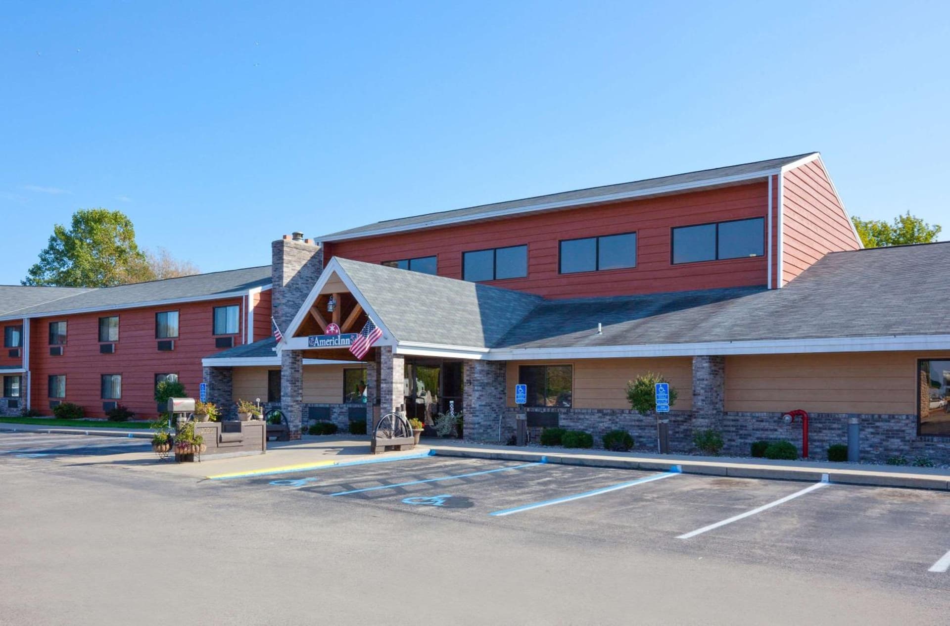 AmericInn by Wyndham Menominee featured exterior or lobby in Menominee, MI — similar hotel