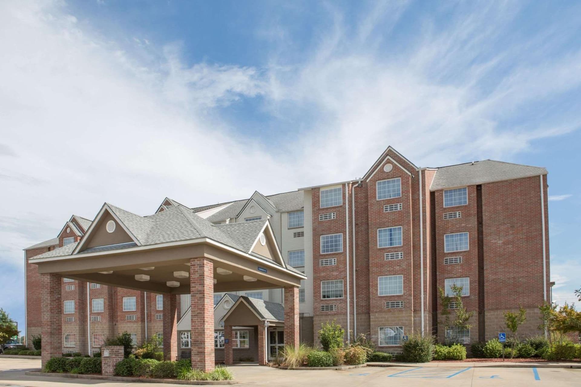 Microtel Inn & Suites by Wyndham Hattiesburg featured exterior or lobby in Hattiesburg, MS — similar hotel