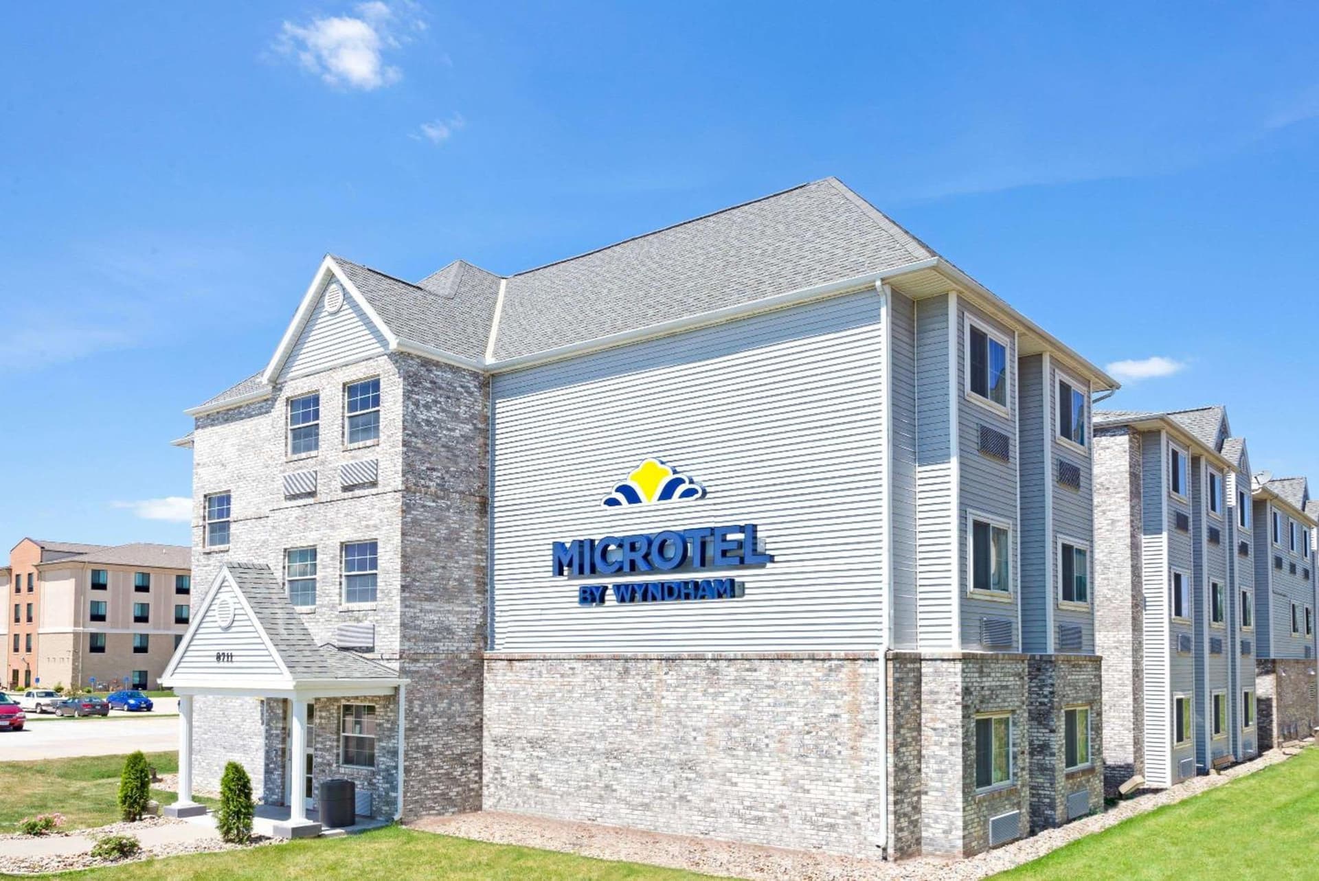 Microtel Inn & Suites Urbandale featured exterior or lobby in Urbandale, IA — similar hotel