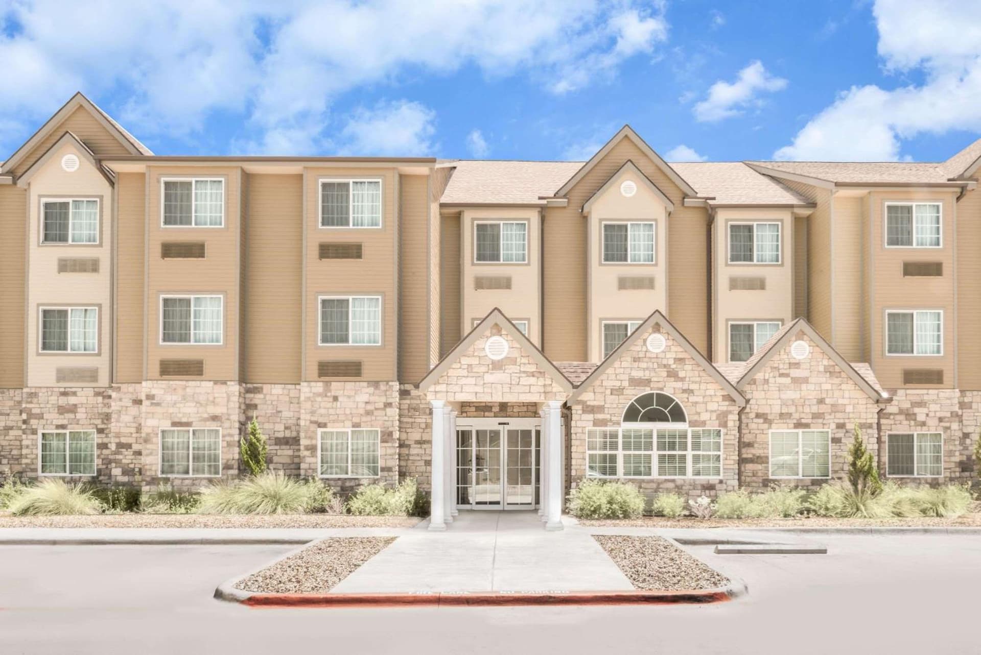 Microtel Inn & Suites by Wyndham featured exterior or lobby in Midland, TX — similar hotel