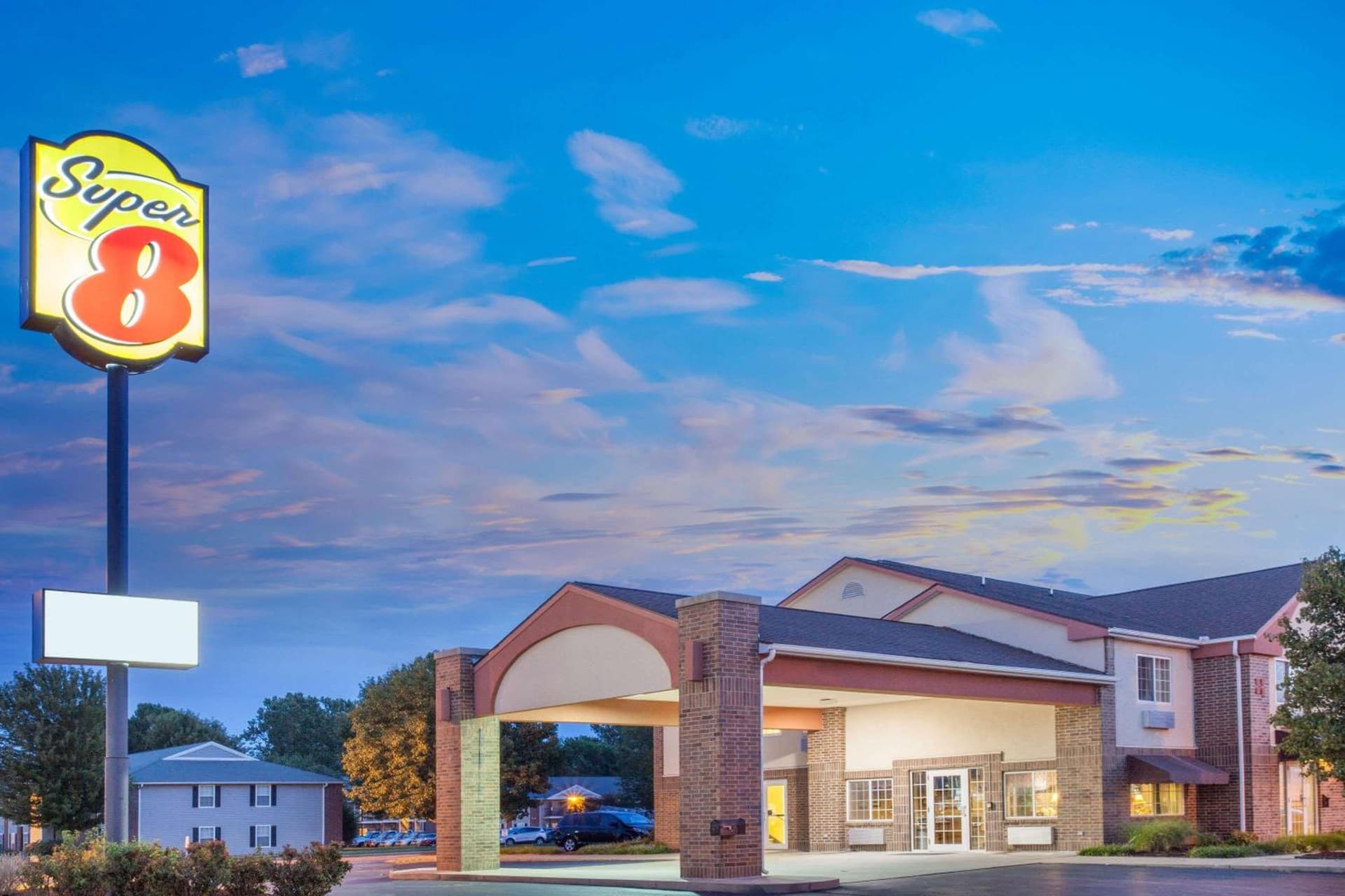 Super 8 by Wyndham Carthage featured exterior or lobby in Carthage, MO — similar hotel