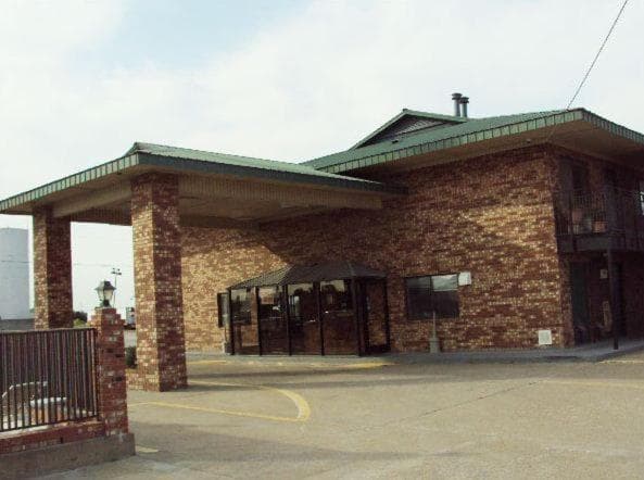 Regency Travel Inn featured exterior or lobby in Hayti, MO — similar hotel