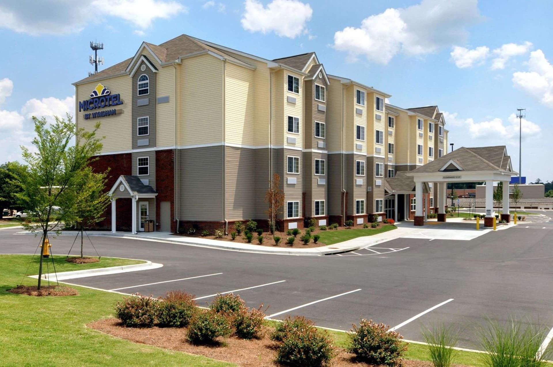 Microtel Inn & Suites by Wyndham Columbus Near Fort Benning featured exterior or lobby in Columbus, GA — similar hotel