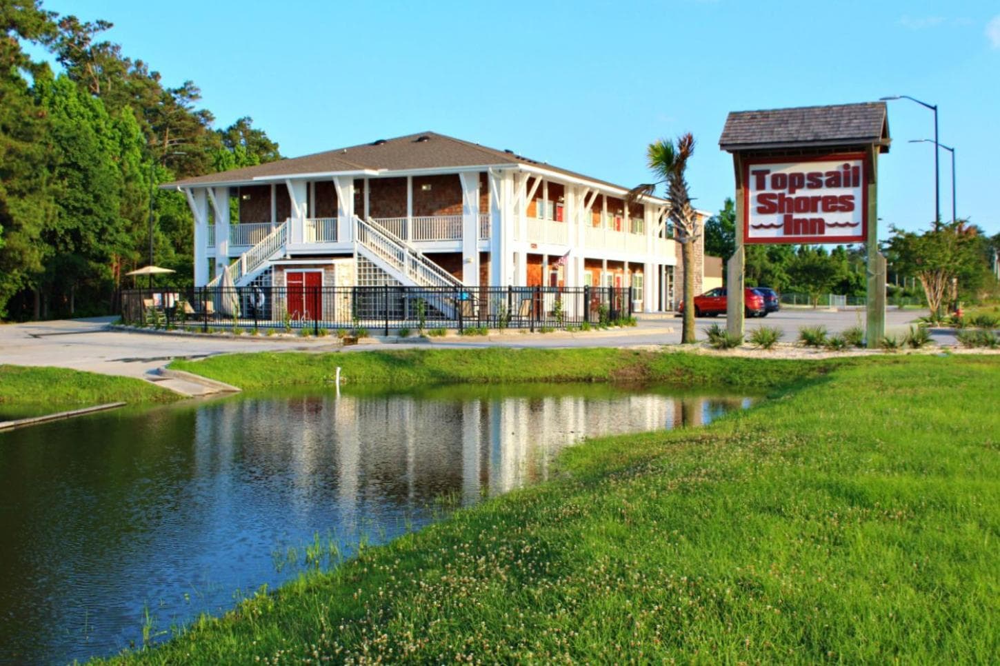 Topsail Shores Inn featured exterior or lobby in Sneads Ferry, NC — similar hotel