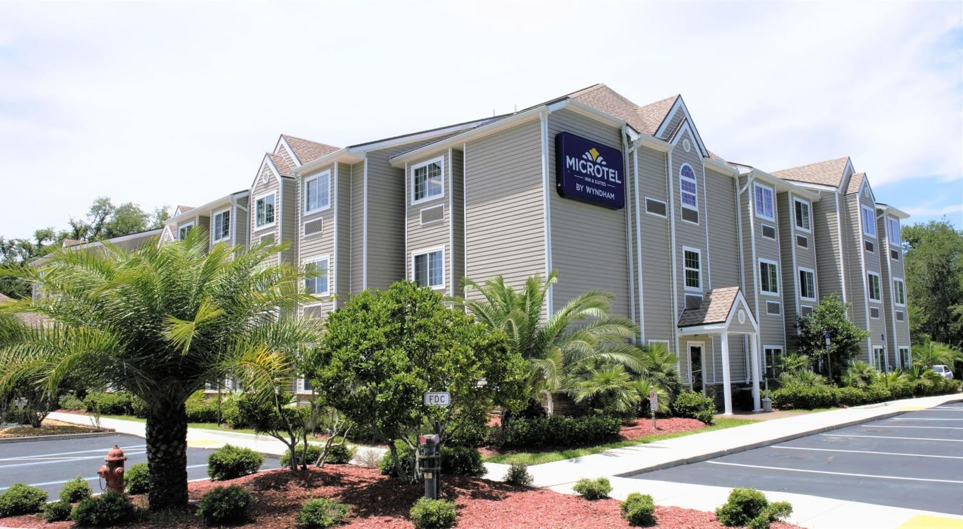Microtel Inn & Suites by Wyndham Jacksonville Airport exterior or lobby in Jacksonville, FL — main listing photo