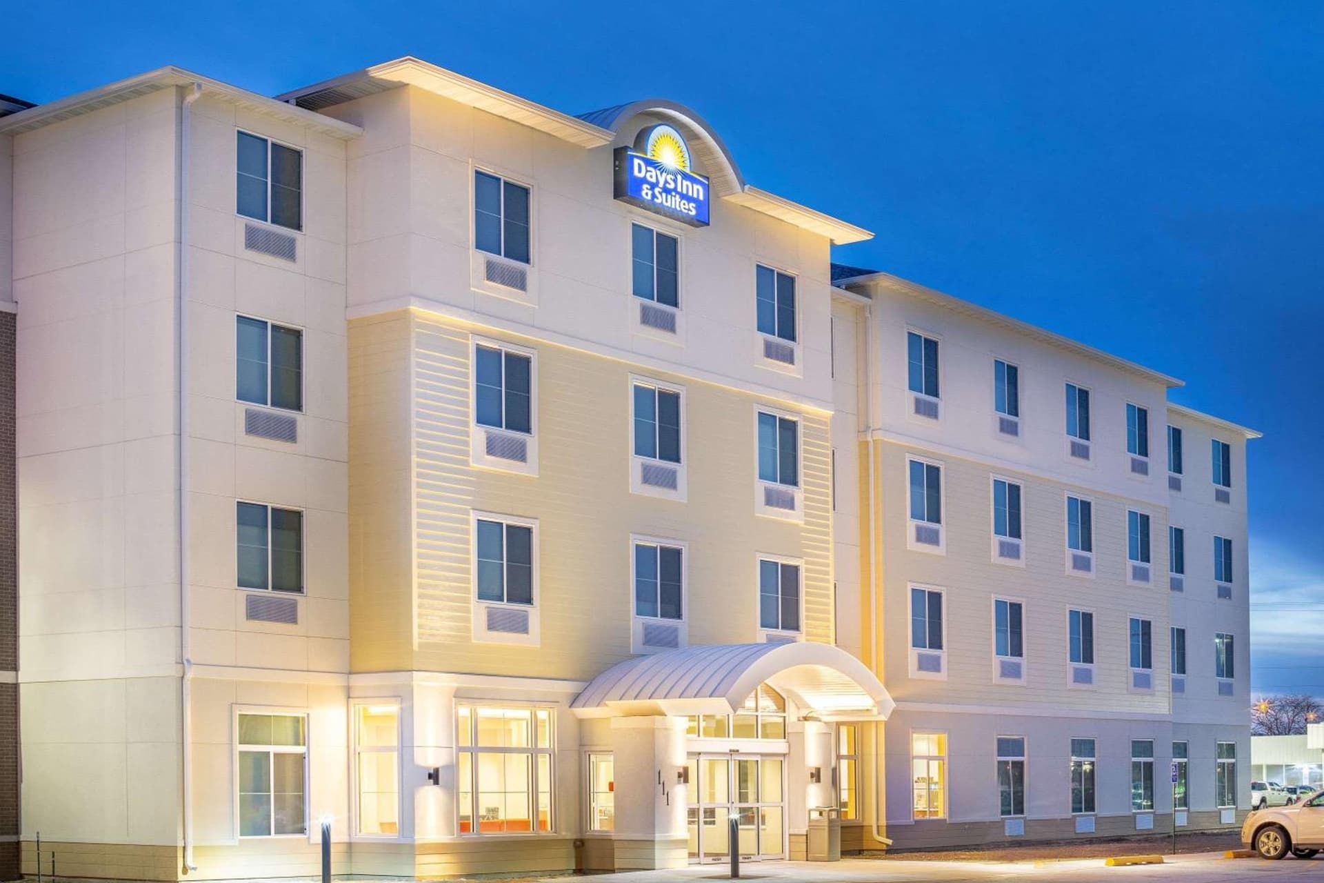 Days Inn & Suites by Wyndham Kearney NE featured exterior or lobby in Kearney, NE — similar hotel